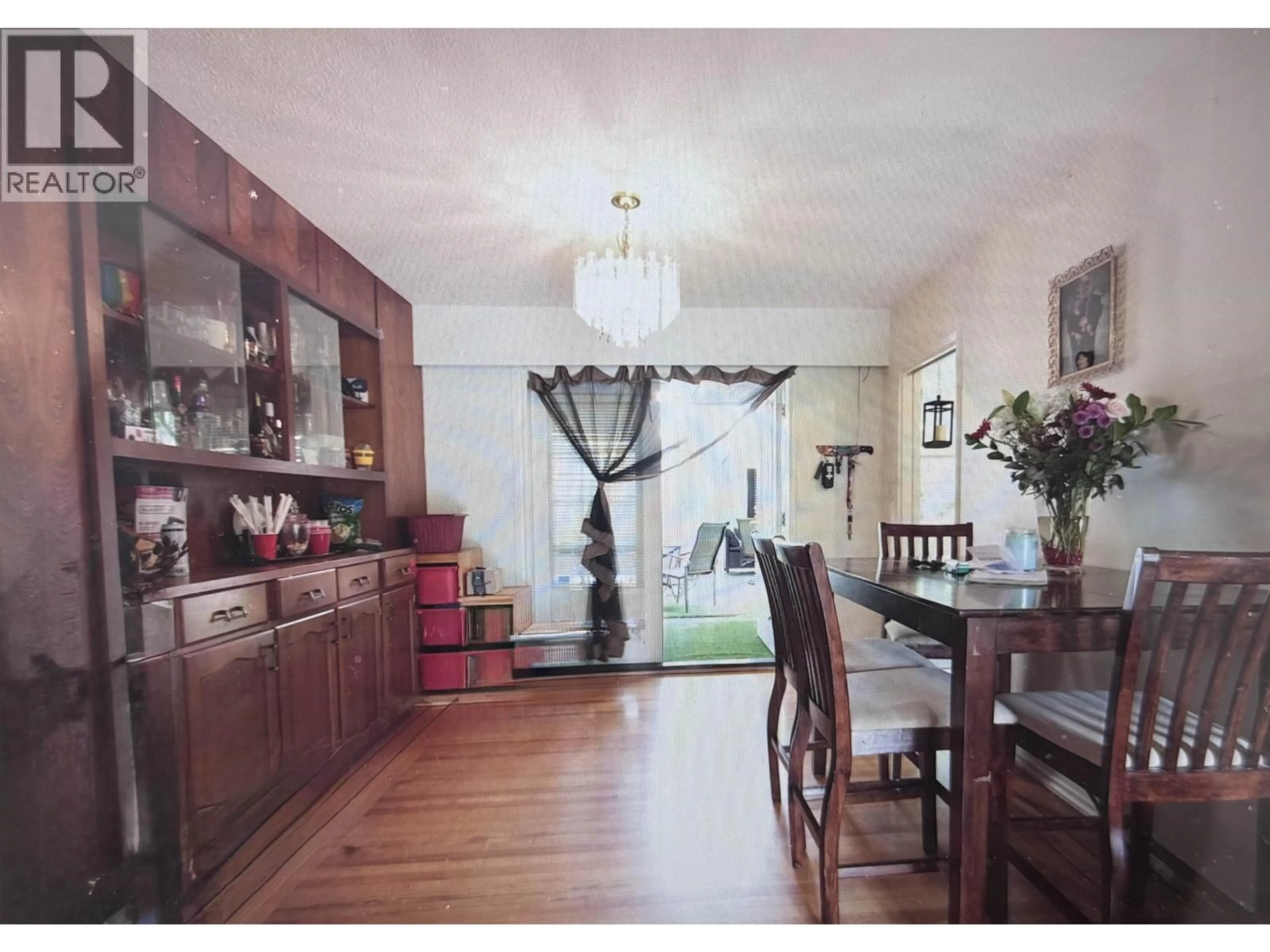 Dining room, wood/laminate floor for 8356 ELLIOT STREET, Vancouver British Columbia V5S2P2