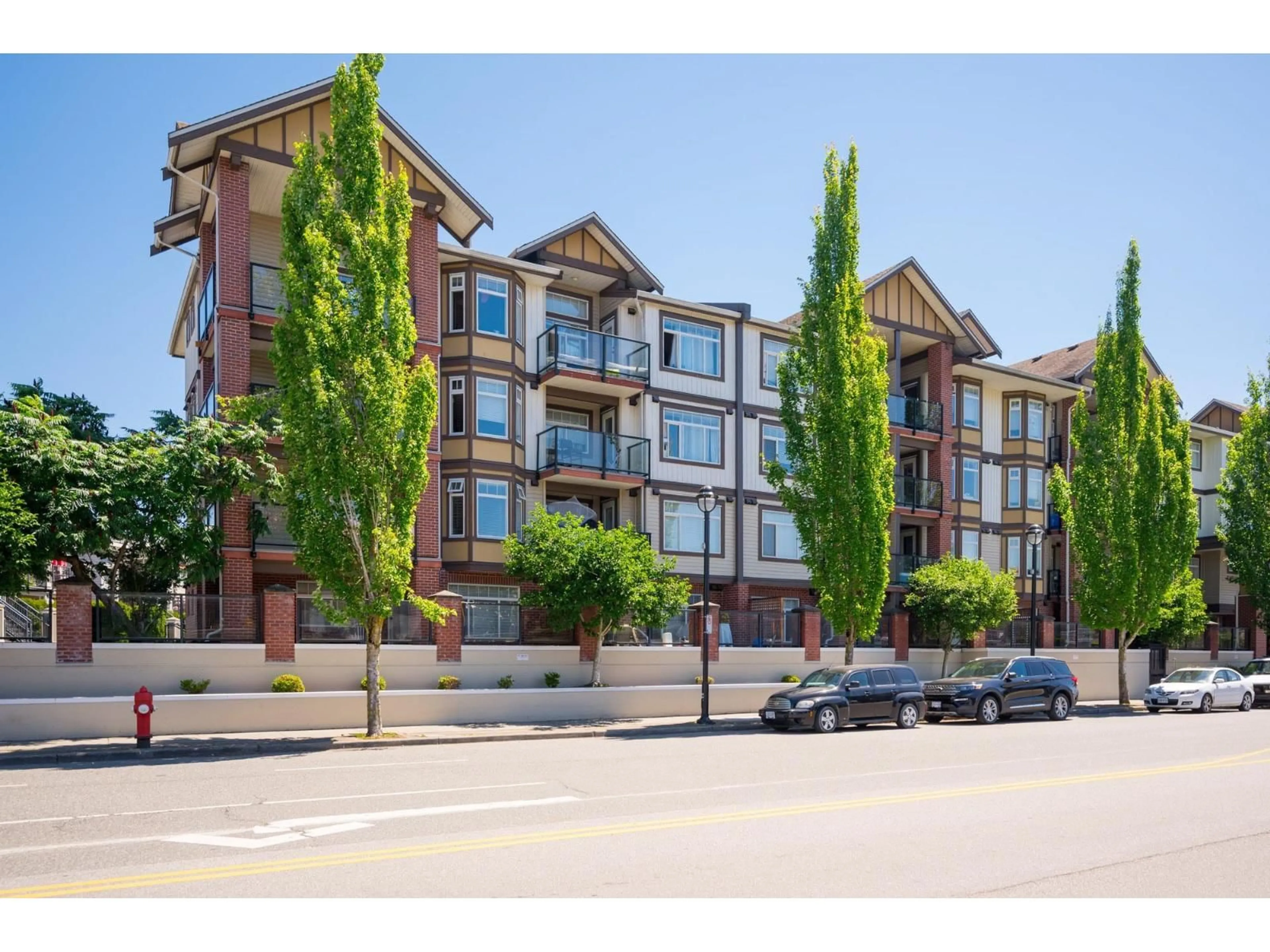 A pic from outside/outdoor area/front of a property/back of a property/a pic from drone, street for 439 - 5660 201A STREET, Langley British Columbia V3A0B4