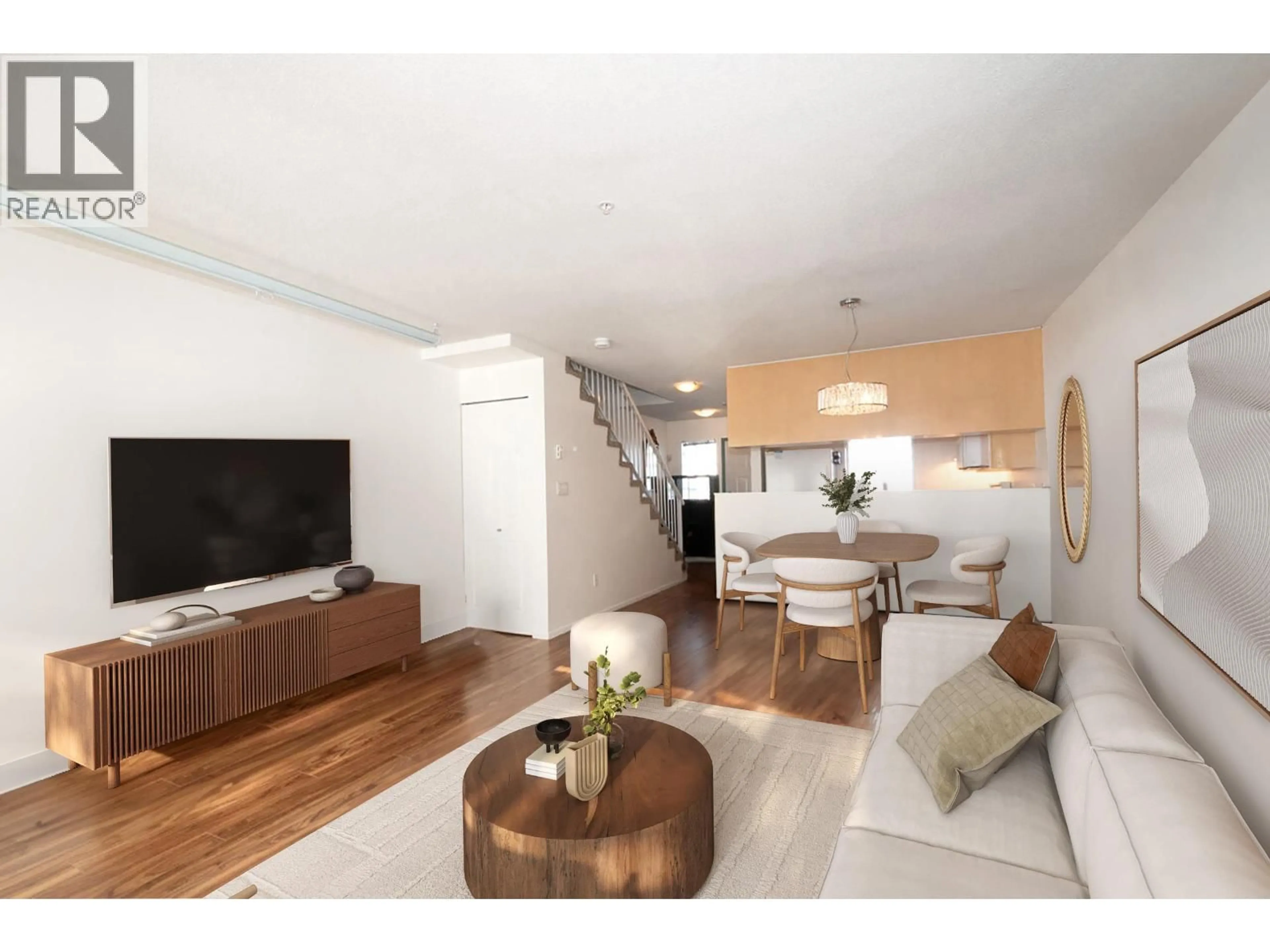 Living room with furniture, wood/laminate floor for 203 - 3368 MAIN STREET, Vancouver British Columbia V5V3M7