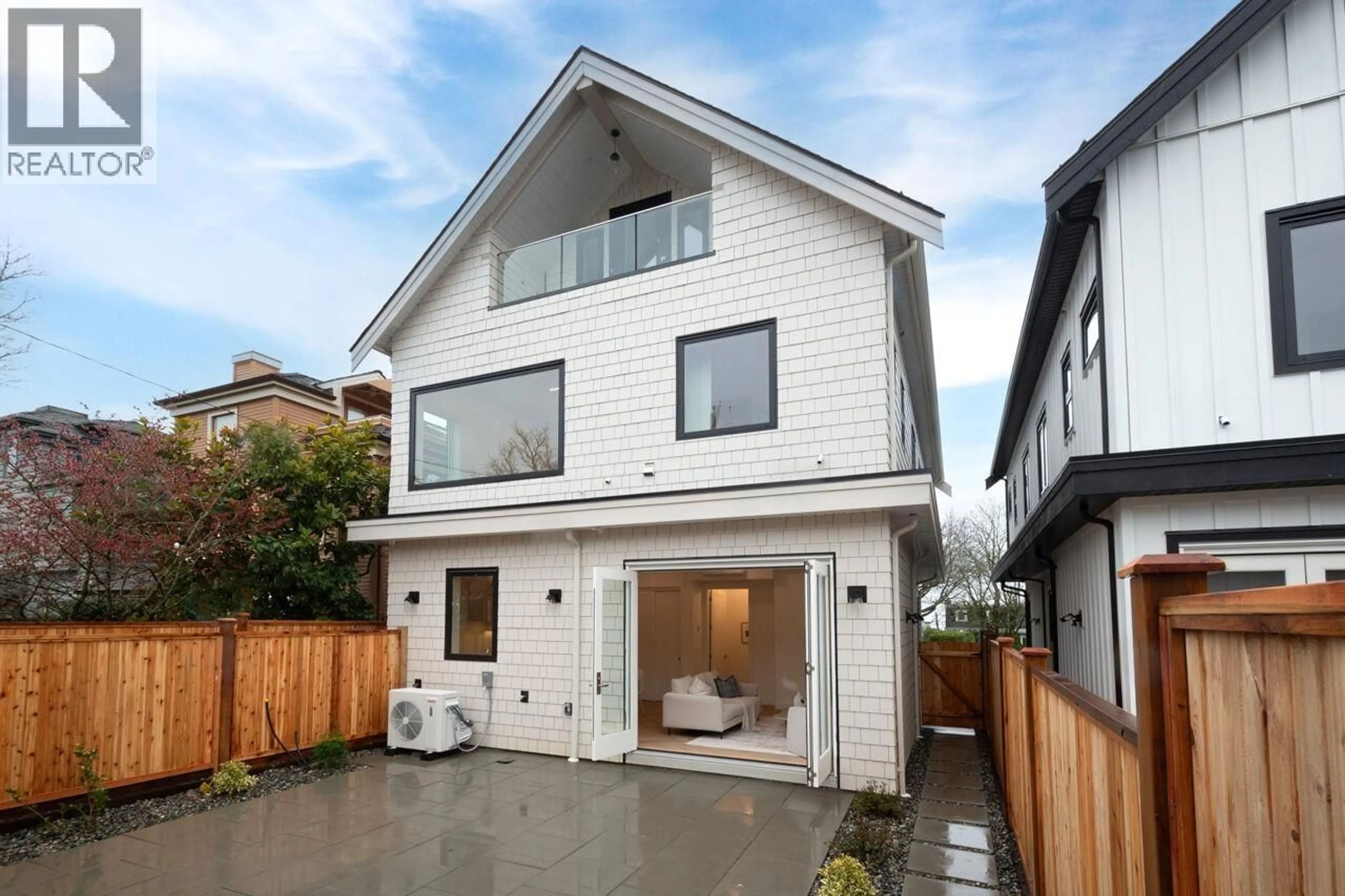 Home with vinyl exterior material, street for 4424 4TH AVENUE, Vancouver British Columbia V6R1R1