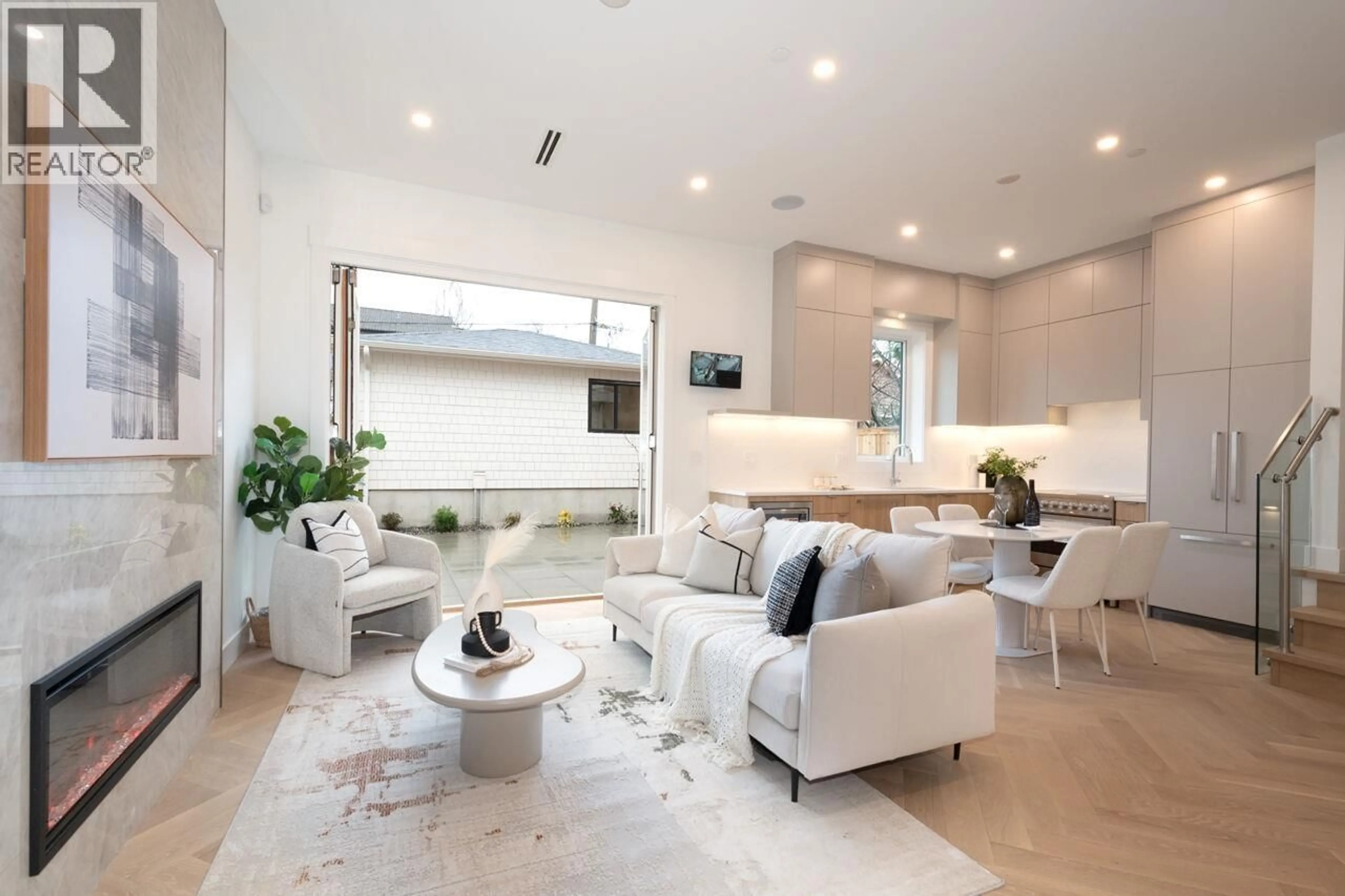 Living room with furniture, ceramic/tile floor for 4424 4TH AVENUE, Vancouver British Columbia V6R1R1