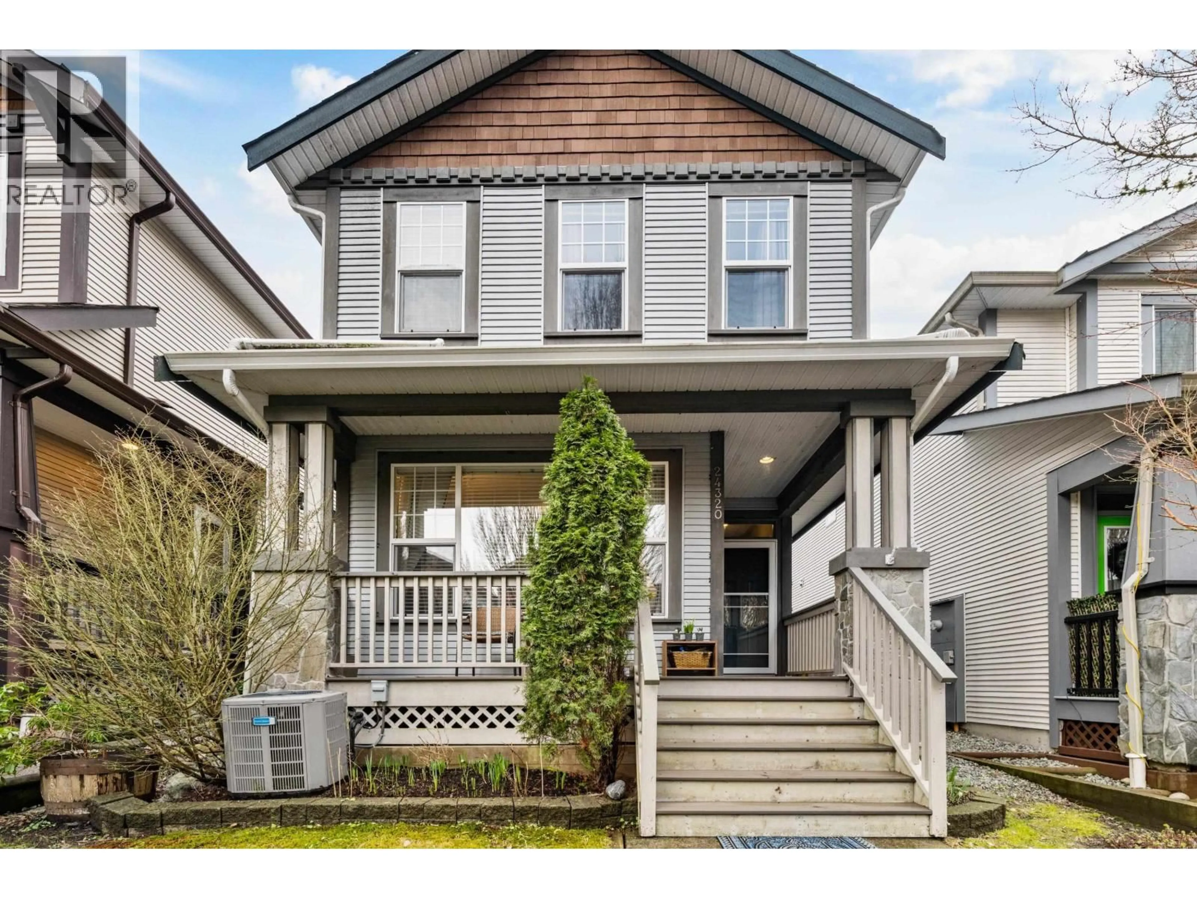 Home with vinyl exterior material, street for 24320 102A AVENUE, Maple Ridge British Columbia V2W1X9