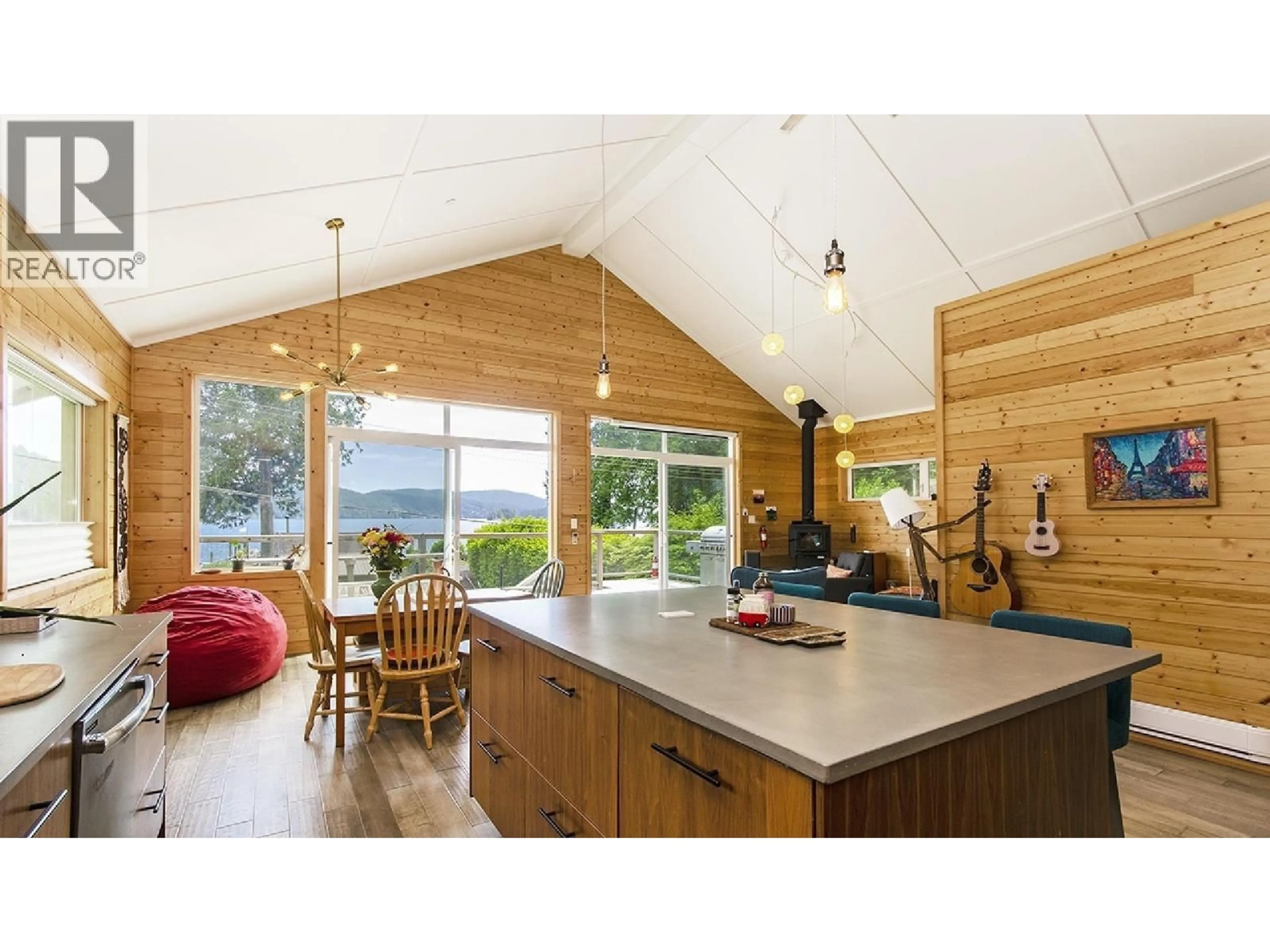 Open concept kitchen, wood/laminate floor for 6 BRIGHTON BEACH, North Vancouver British Columbia V0V0V0