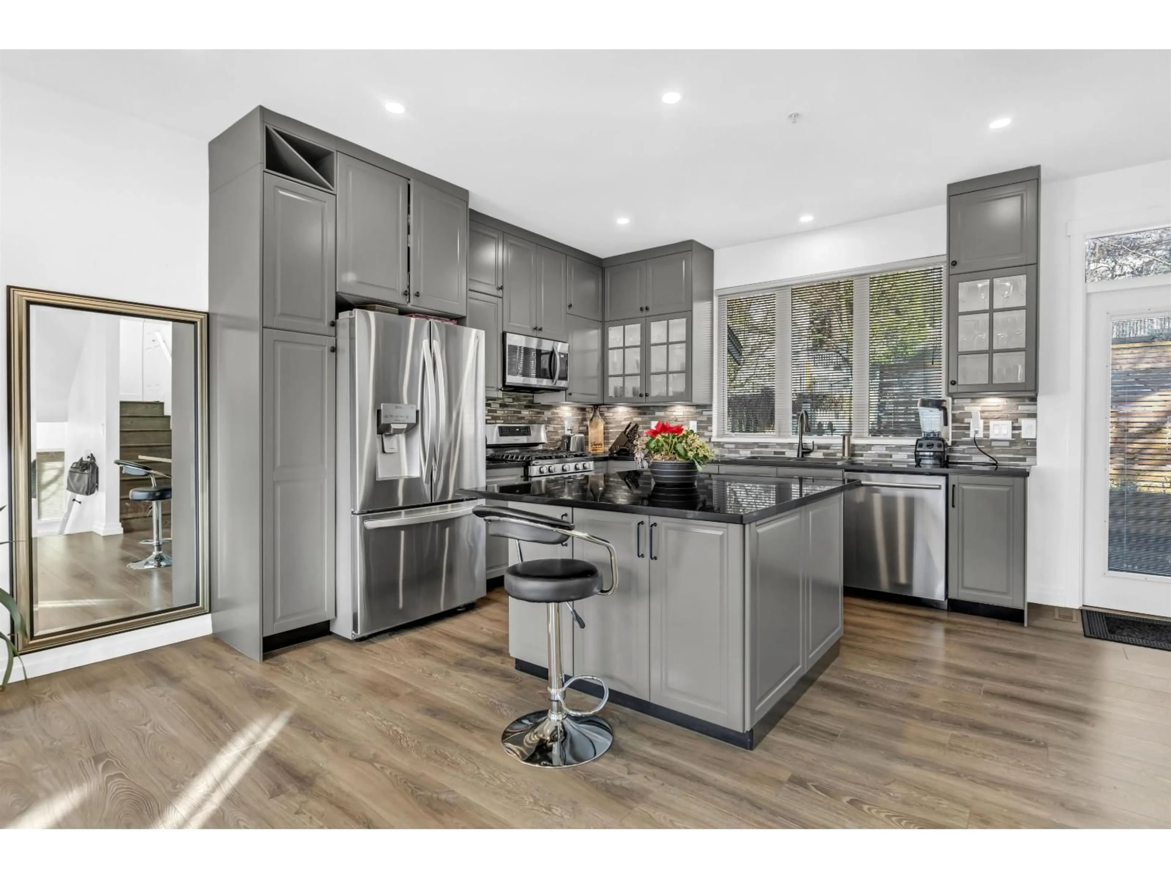 Open concept kitchen, wood/laminate floor for 35 - 20326 68 AVENUE, Langley British Columbia V2Y0E3