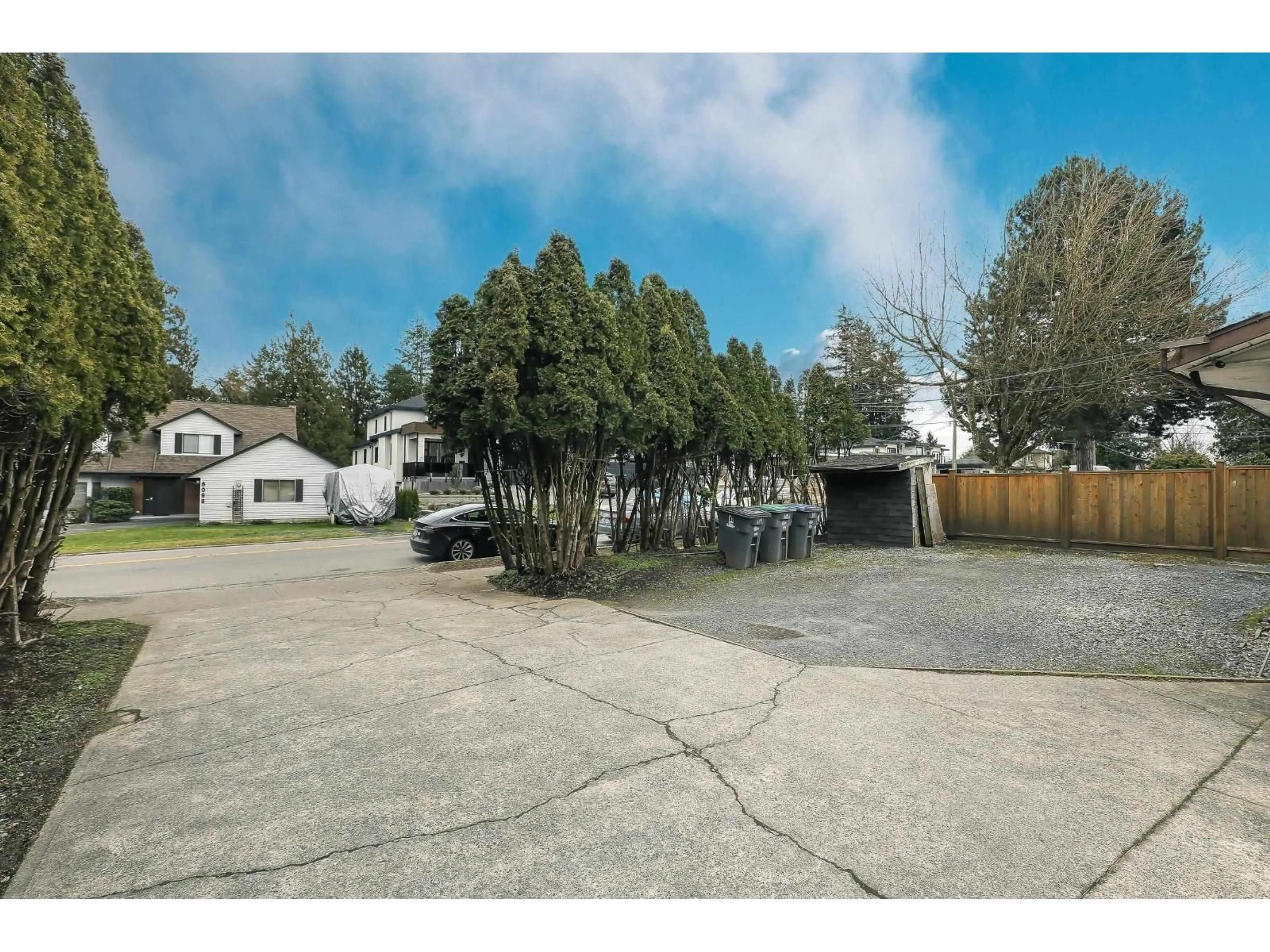 A pic from outside/outdoor area/front of a property/back of a property/a pic from drone, street for 6091 172 STREET, Surrey British Columbia V3S4Y2