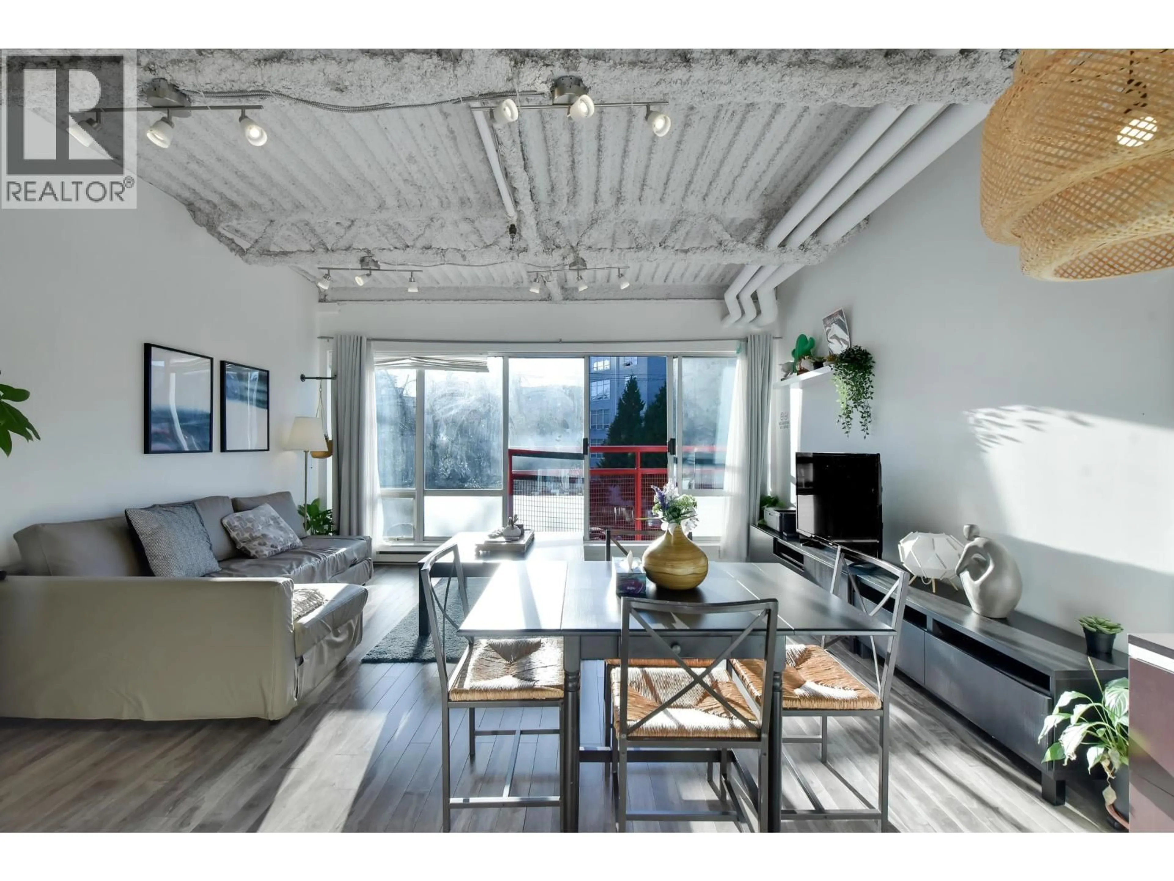 Living room with furniture, cement floor for 305 - 350 2ND AVENUE, Vancouver British Columbia V5T4R8