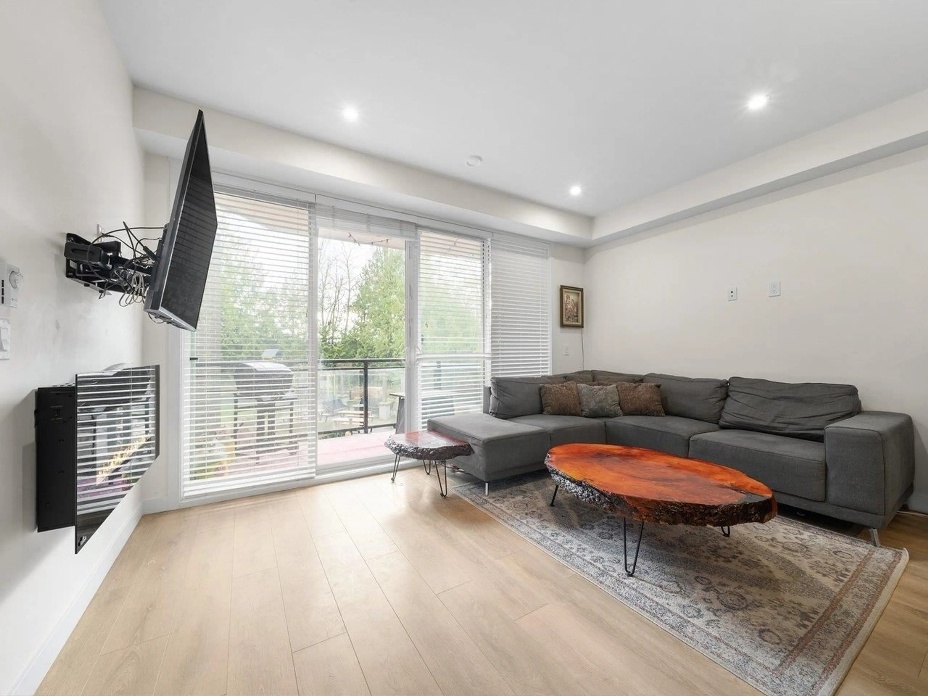 Living room with furniture, wood/laminate floor for 219 - 5415 BRYDON CRESCENT, Langley British Columbia V3A0N4