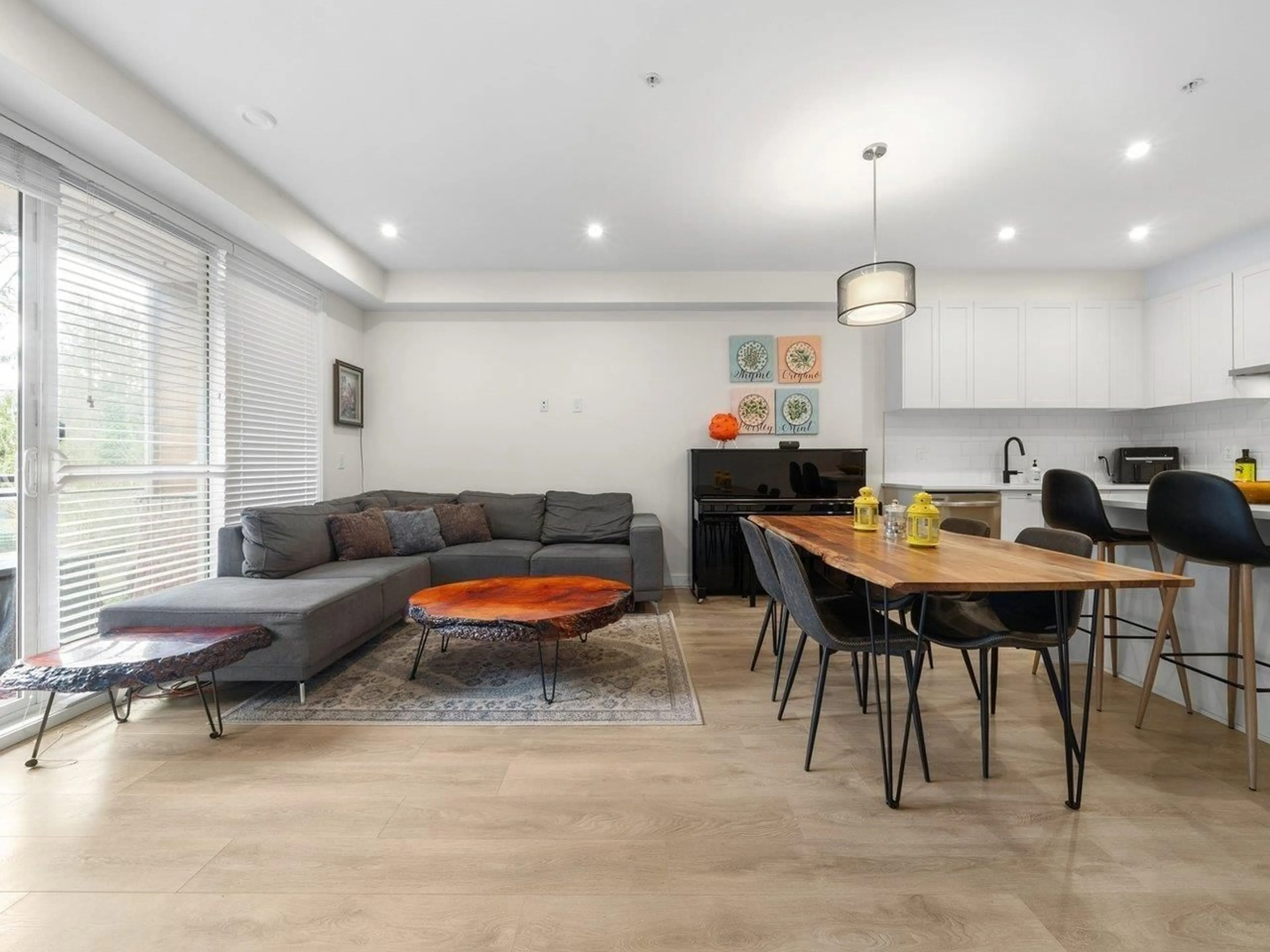 Living room with furniture, wood/laminate floor for 219 - 5415 BRYDON CRESCENT, Langley British Columbia V3A0N4