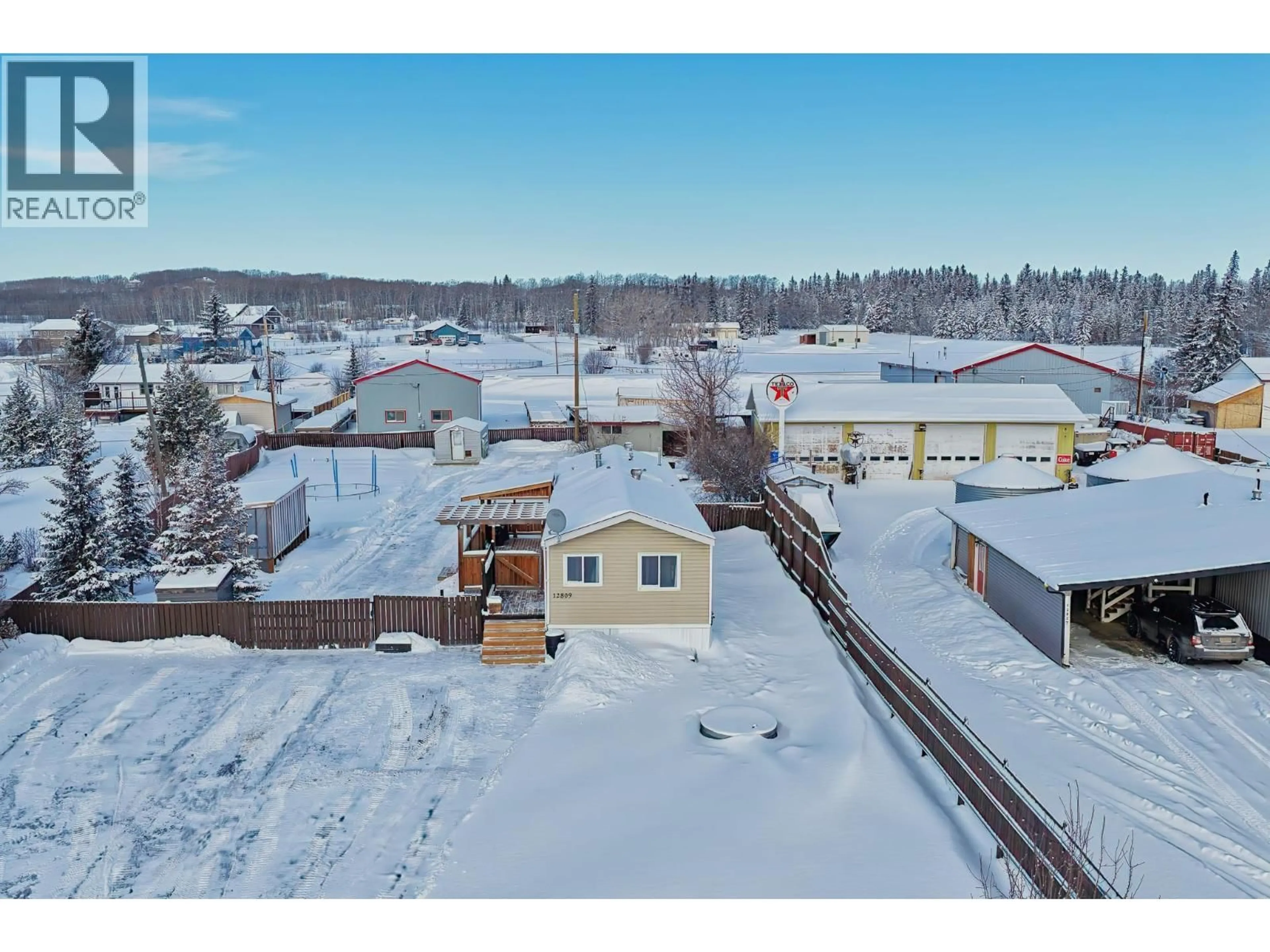 A pic from outside/outdoor area/front of a property/back of a property/a pic from drone, unknown for 12809 MEADOW HEIGHTS ROAD, Fort St. John British Columbia V1J8C4