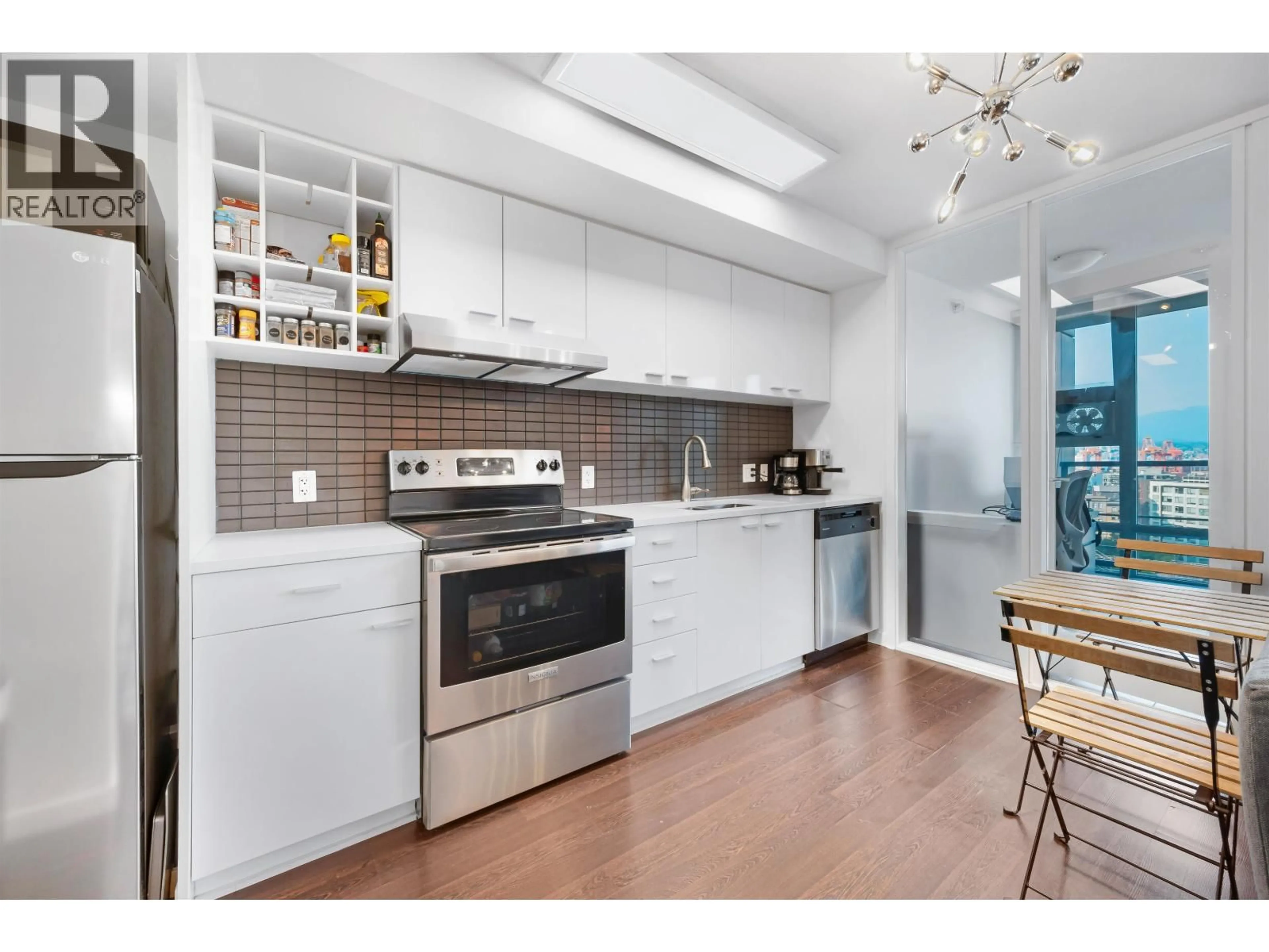 Open concept kitchen, ceramic/tile floor for 1207 - 602 CITADEL PARADE, Vancouver British Columbia V6B1X2