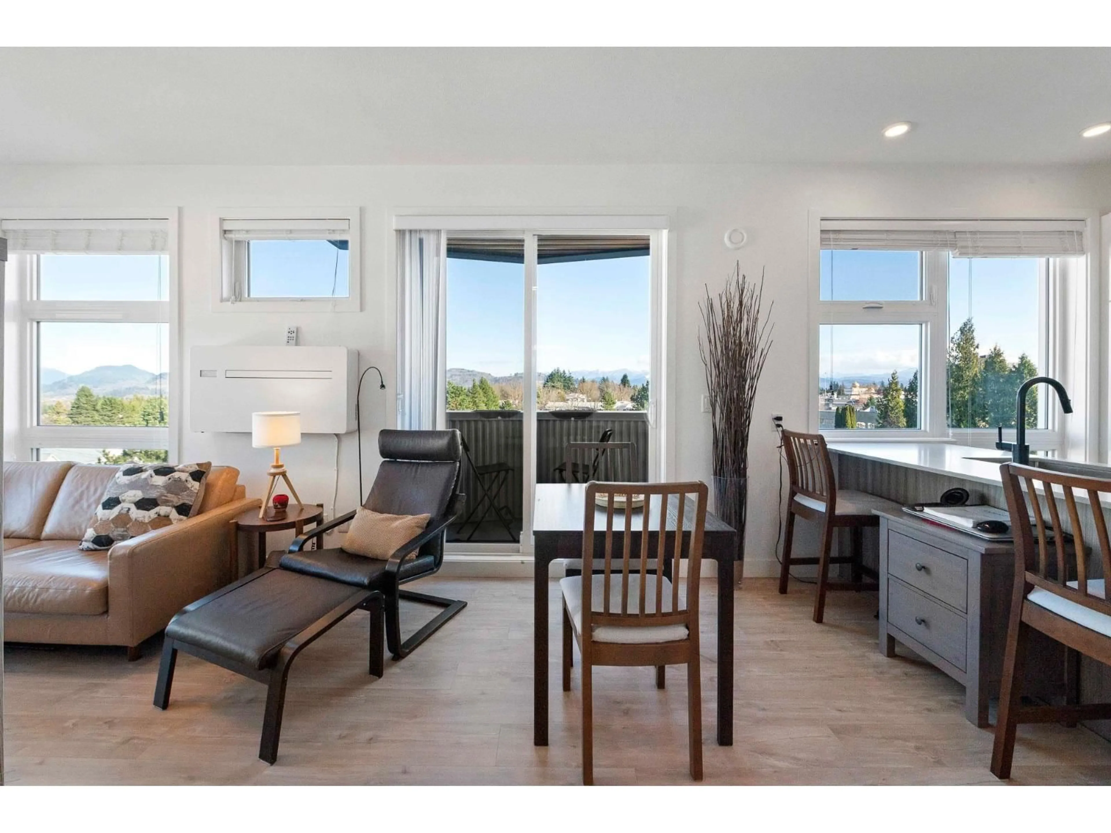 Living room with furniture, wood/laminate floor for 601 - 32838 LANDEAU PLACE, Abbotsford British Columbia V2S0M6