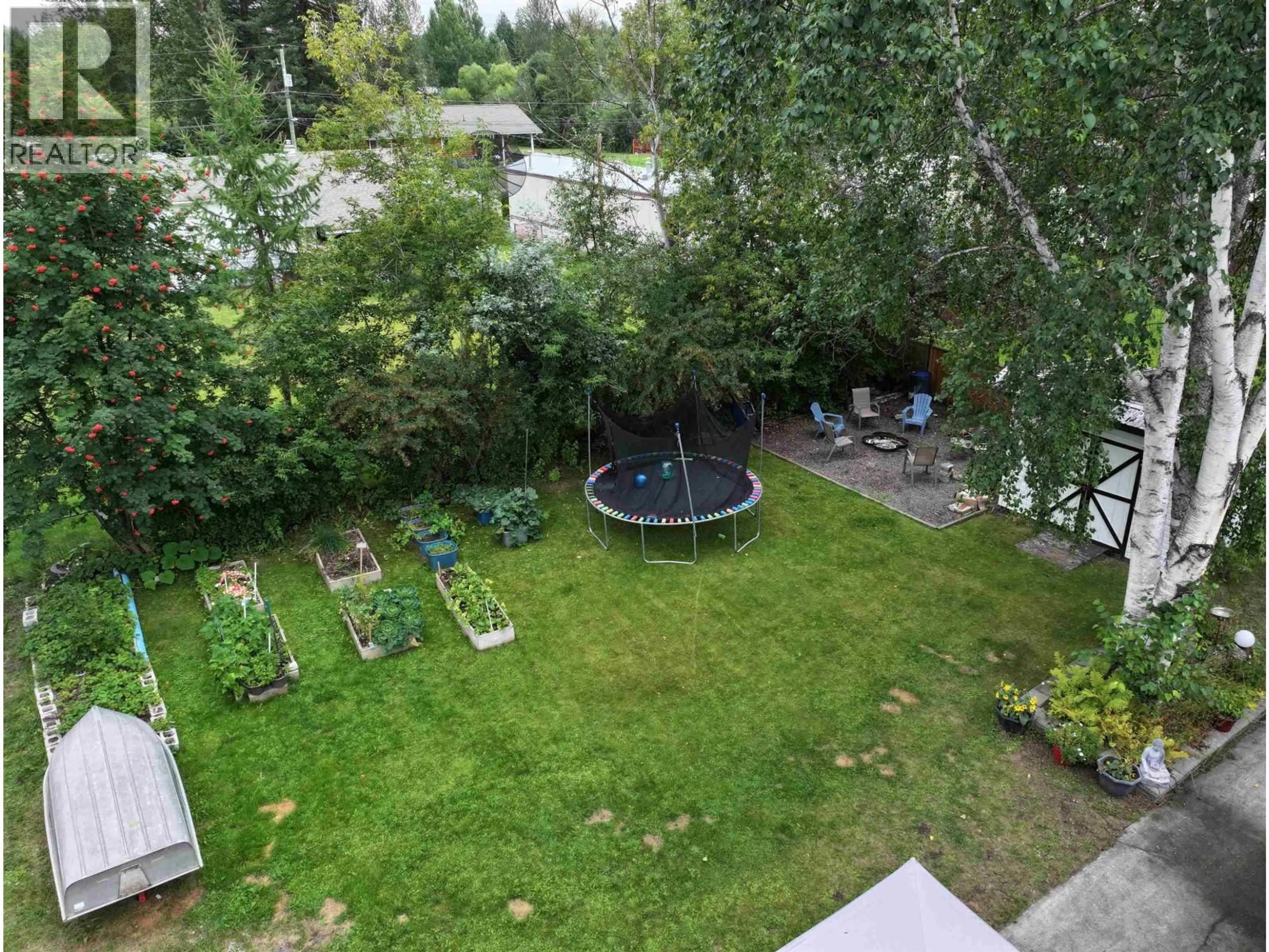 A pic from outside/outdoor area/front of a property/back of a property/a pic from drone, forest/trees view for 1772 POPLAR AVENUE, Quesnel British Columbia V2J3Z5