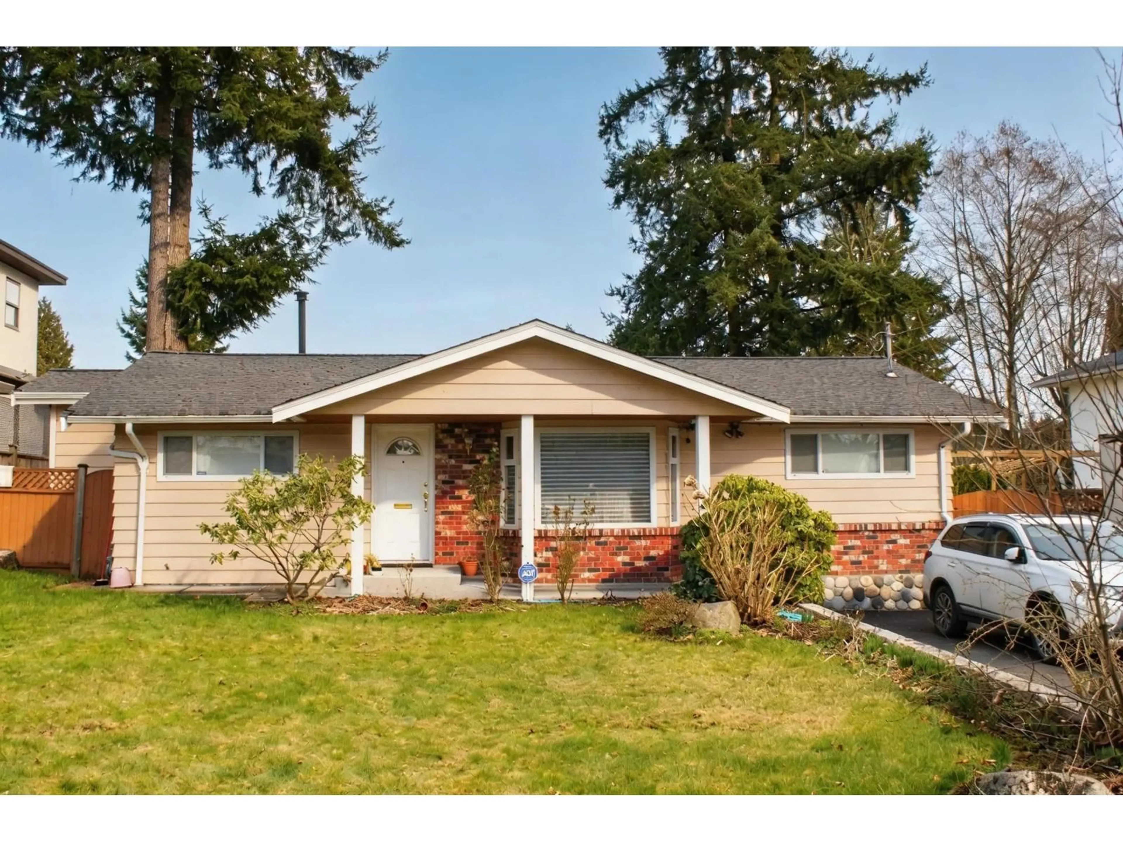 Home with vinyl exterior material, street for 8722 154A STREET, Surrey British Columbia V3S3N9