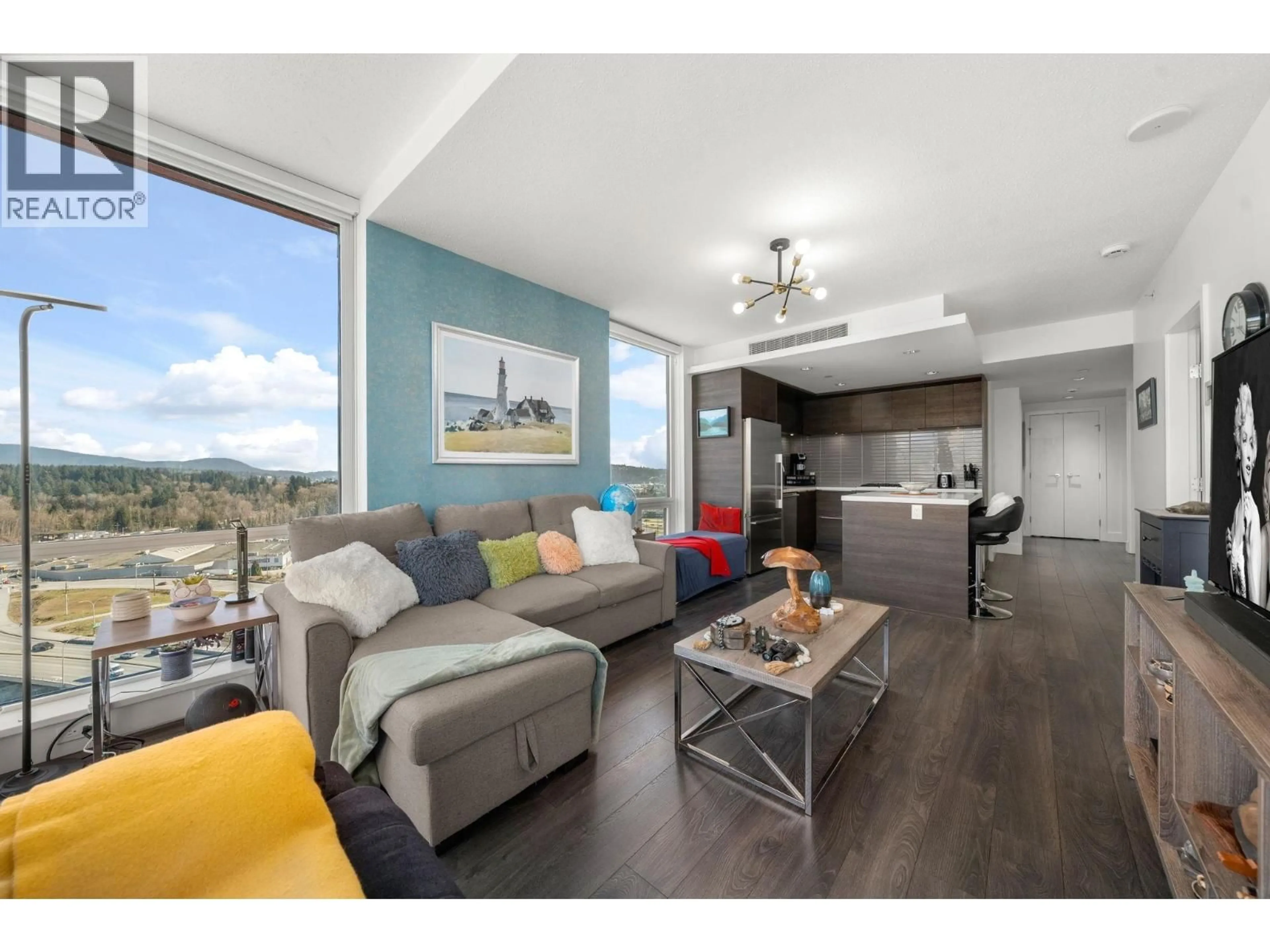 Living room with furniture, wood/laminate floor for 2202 - 1550 FERN STREET, North Vancouver British Columbia V7J0A9