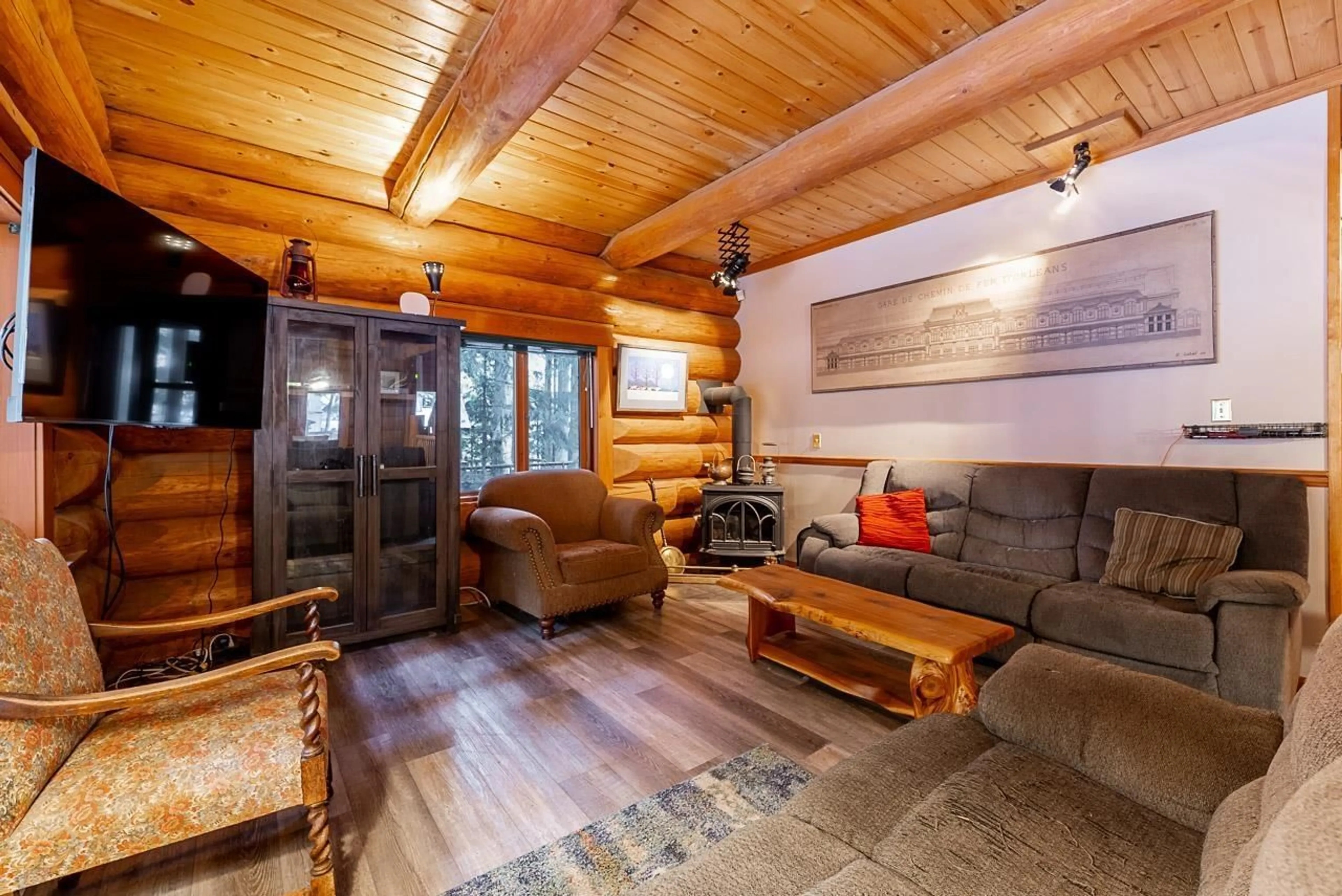 Living room with furniture, wood/laminate floor for 71692 CONE COURT, Sunshine Valley British Columbia V0X1L5