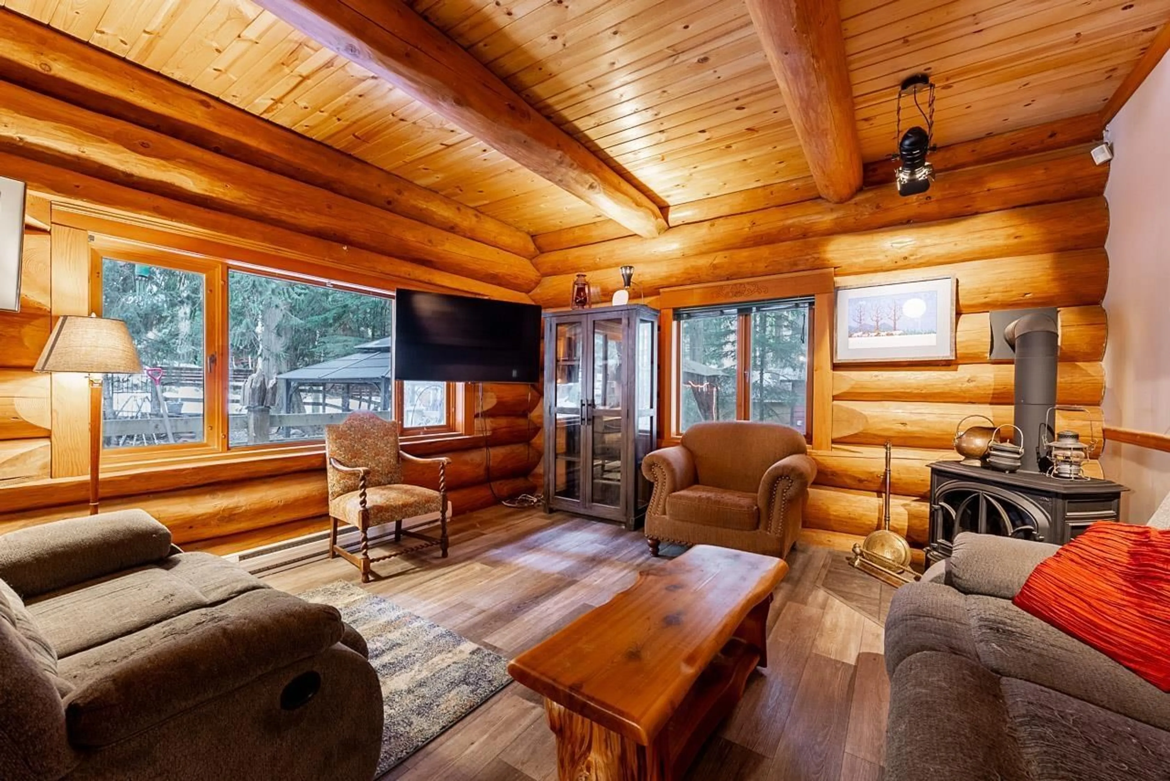 Living room with furniture, wood/laminate floor for 71692 CONE COURT, Sunshine Valley British Columbia V0X1L5