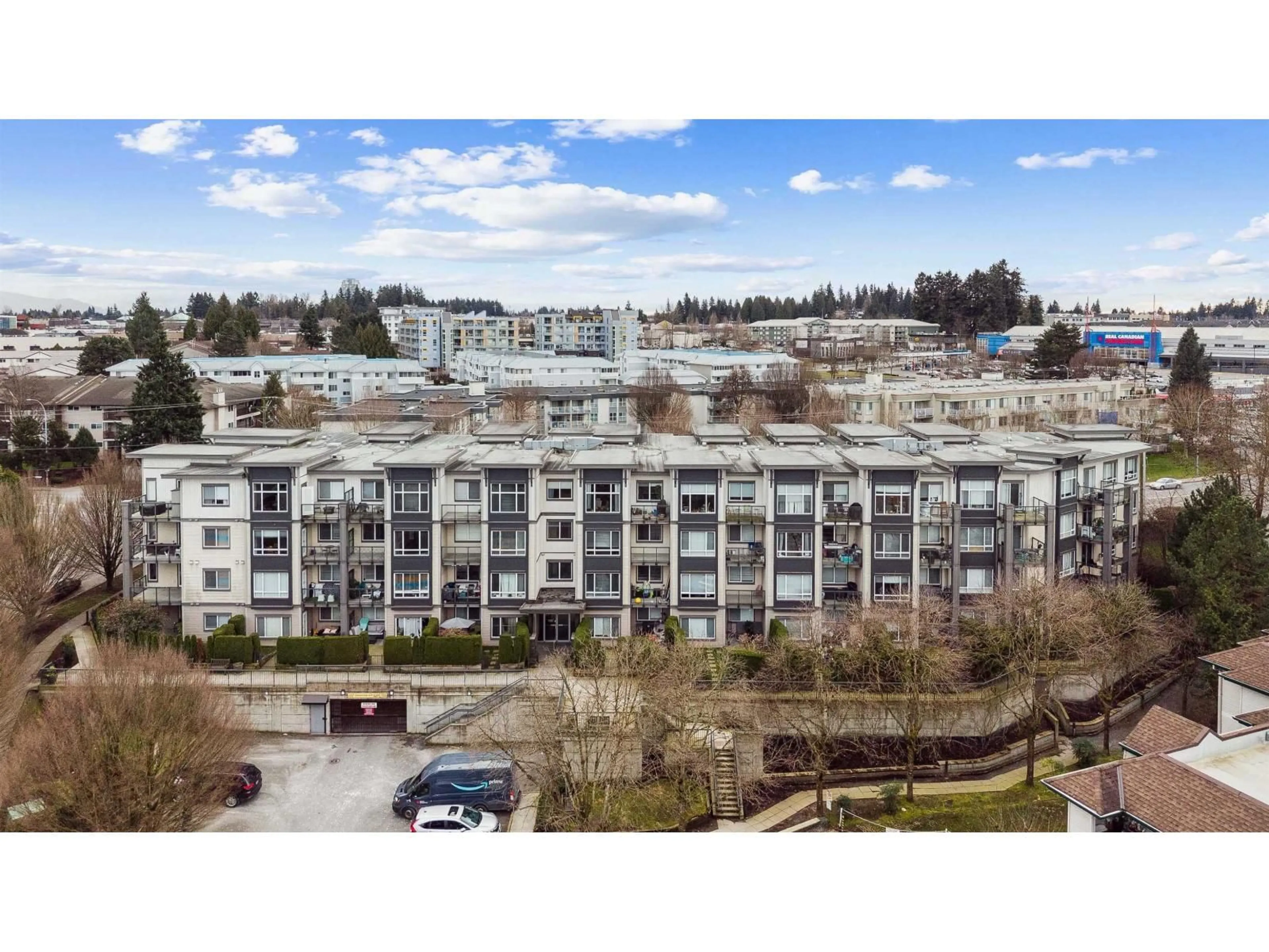 A pic from outside/outdoor area/front of a property/back of a property/a pic from drone, city buildings view from balcony for 215 - 2943 NELSON PLACE, Abbotsford British Columbia V2S0C8