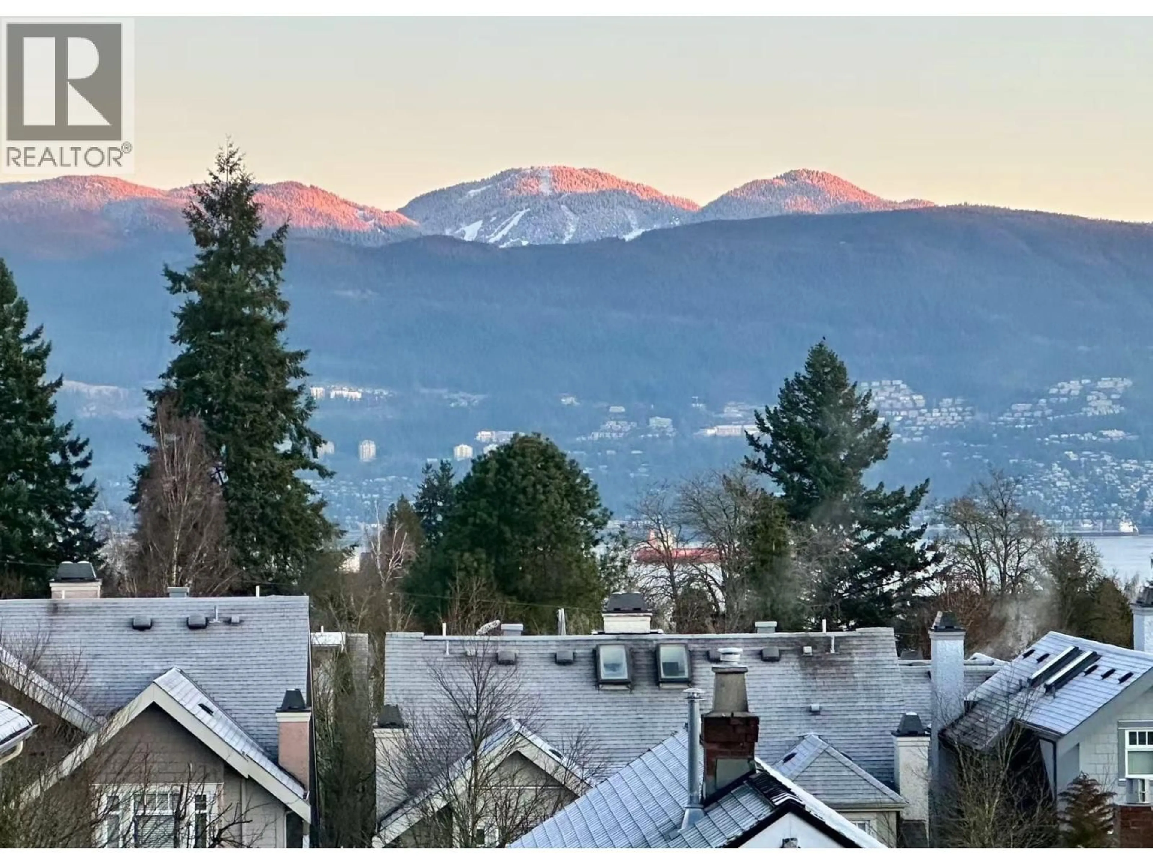 A pic from outside/outdoor area/front of a property/back of a property/a pic from drone, mountain view for 305 - 4463 10TH AVENUE, Vancouver British Columbia V6R2H8