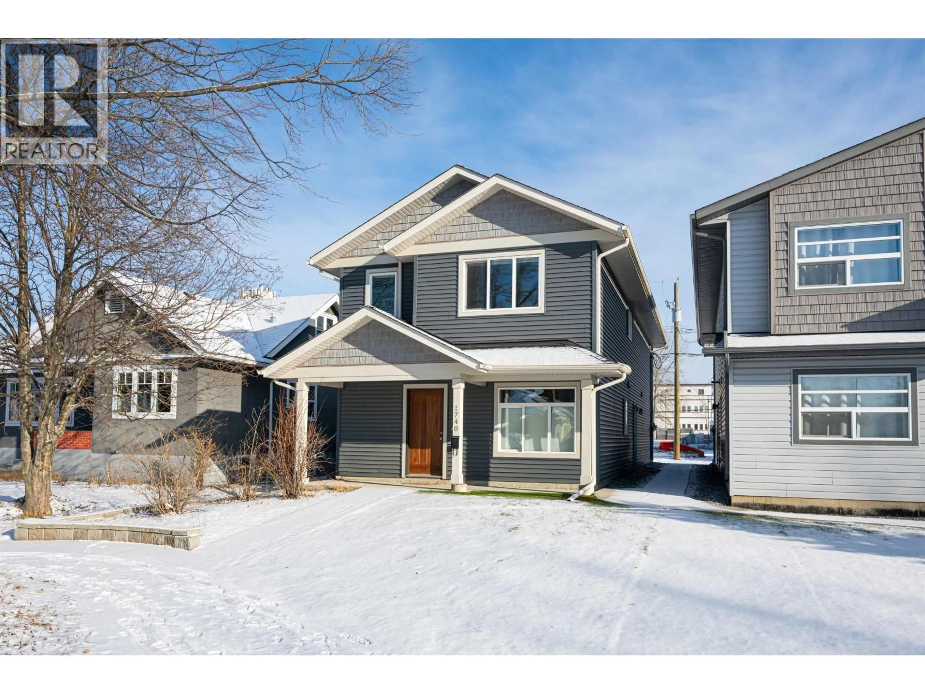 Home with vinyl exterior material, street for 1740 5TH AVENUE, Prince George British Columbia V2L3M3