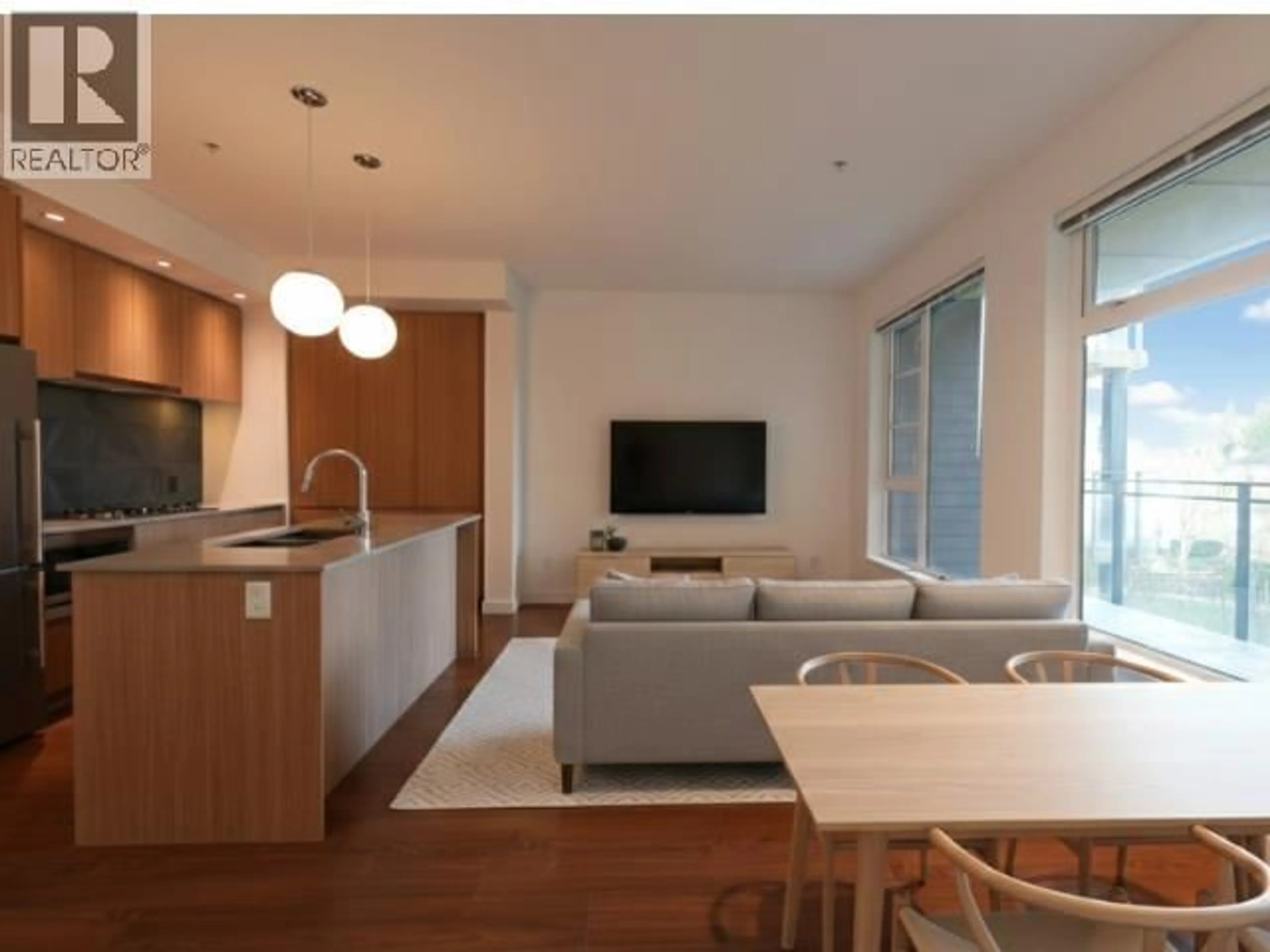 Living room with furniture, wood/laminate floor for 320 - 516 FOSTER AVENUE, Coquitlam British Columbia V3J0H8