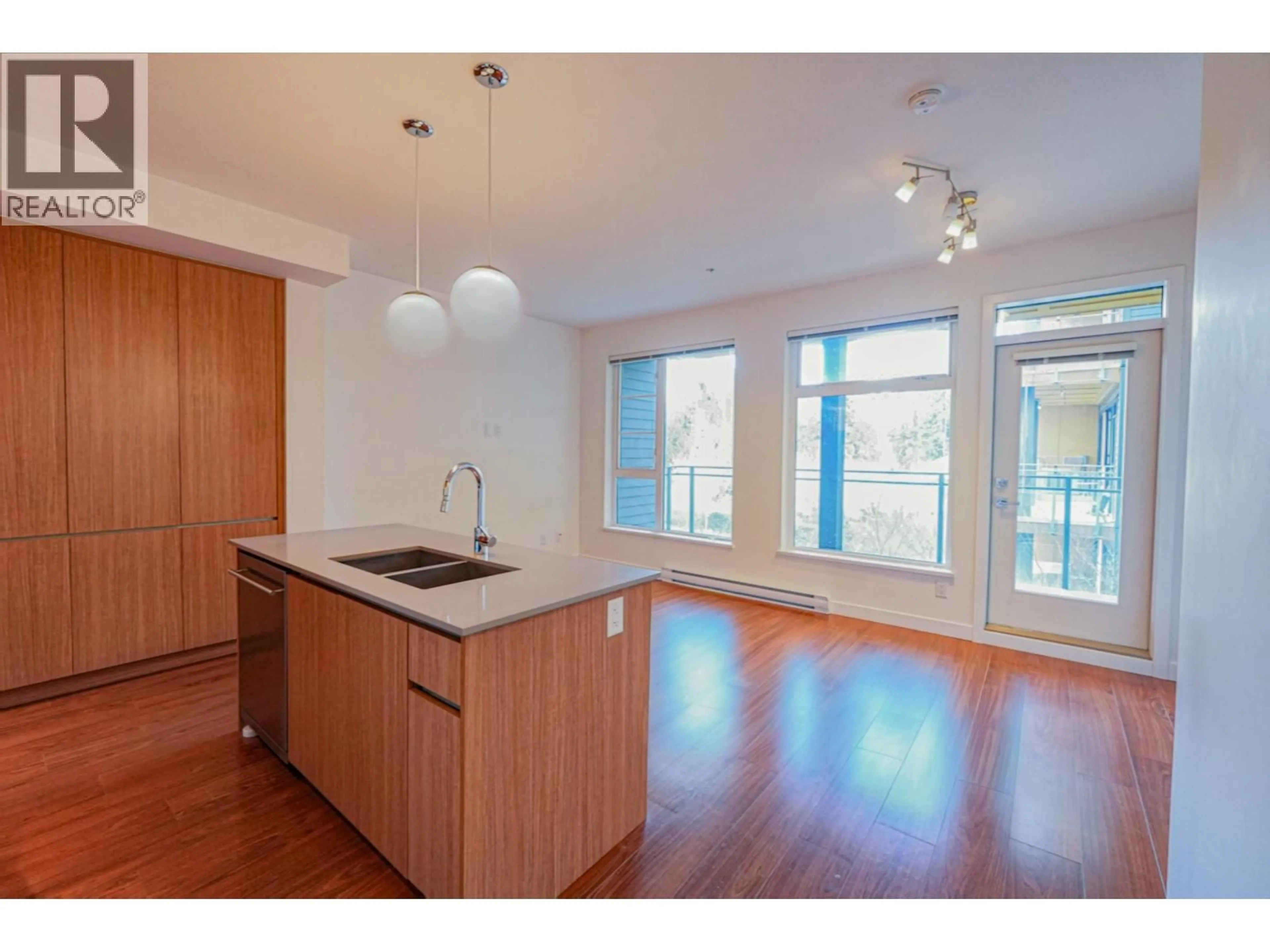 Open concept kitchen, wood/laminate floor for 320 - 516 FOSTER AVENUE, Coquitlam British Columbia V3J0H8