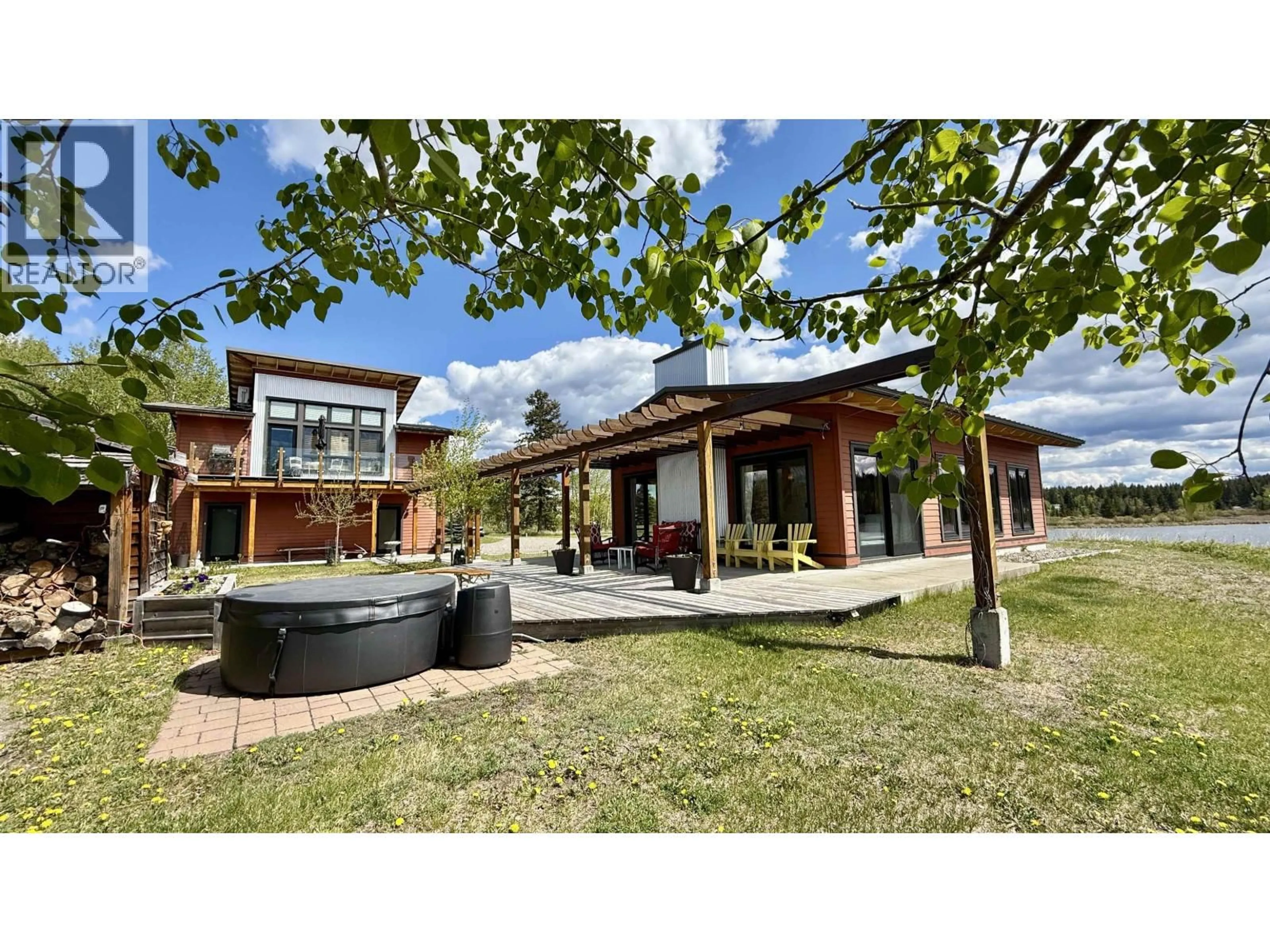 A pic from outside/outdoor area/front of a property/back of a property/a pic from drone, unknown for 5460 CARLSON ROAD, 100 Mile House British Columbia V0K2E1