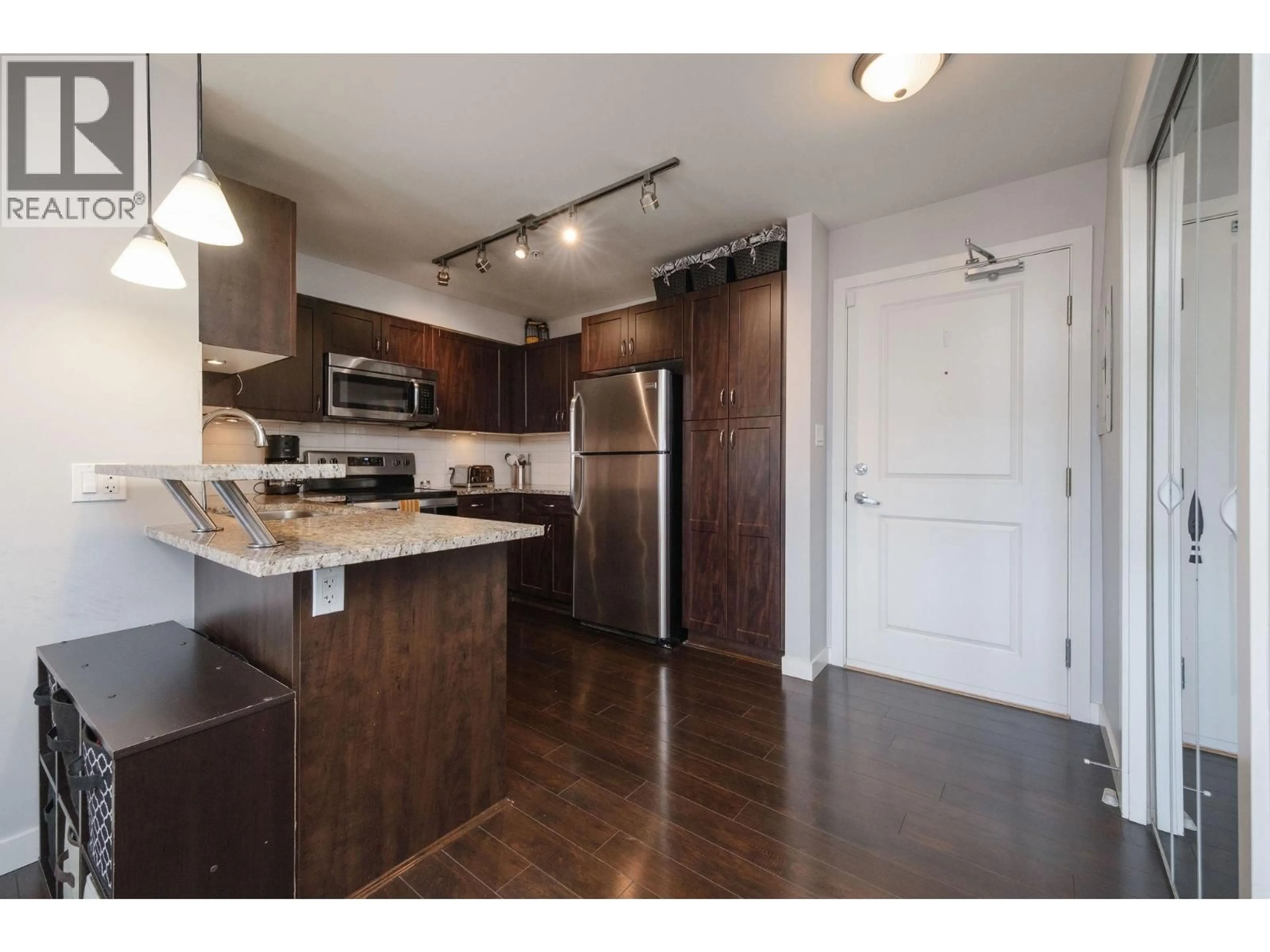 Open concept kitchen, wood/laminate floor for 306 - 2191 SHAUGHNESSY STREET, Port Coquitlam British Columbia V3C3C7