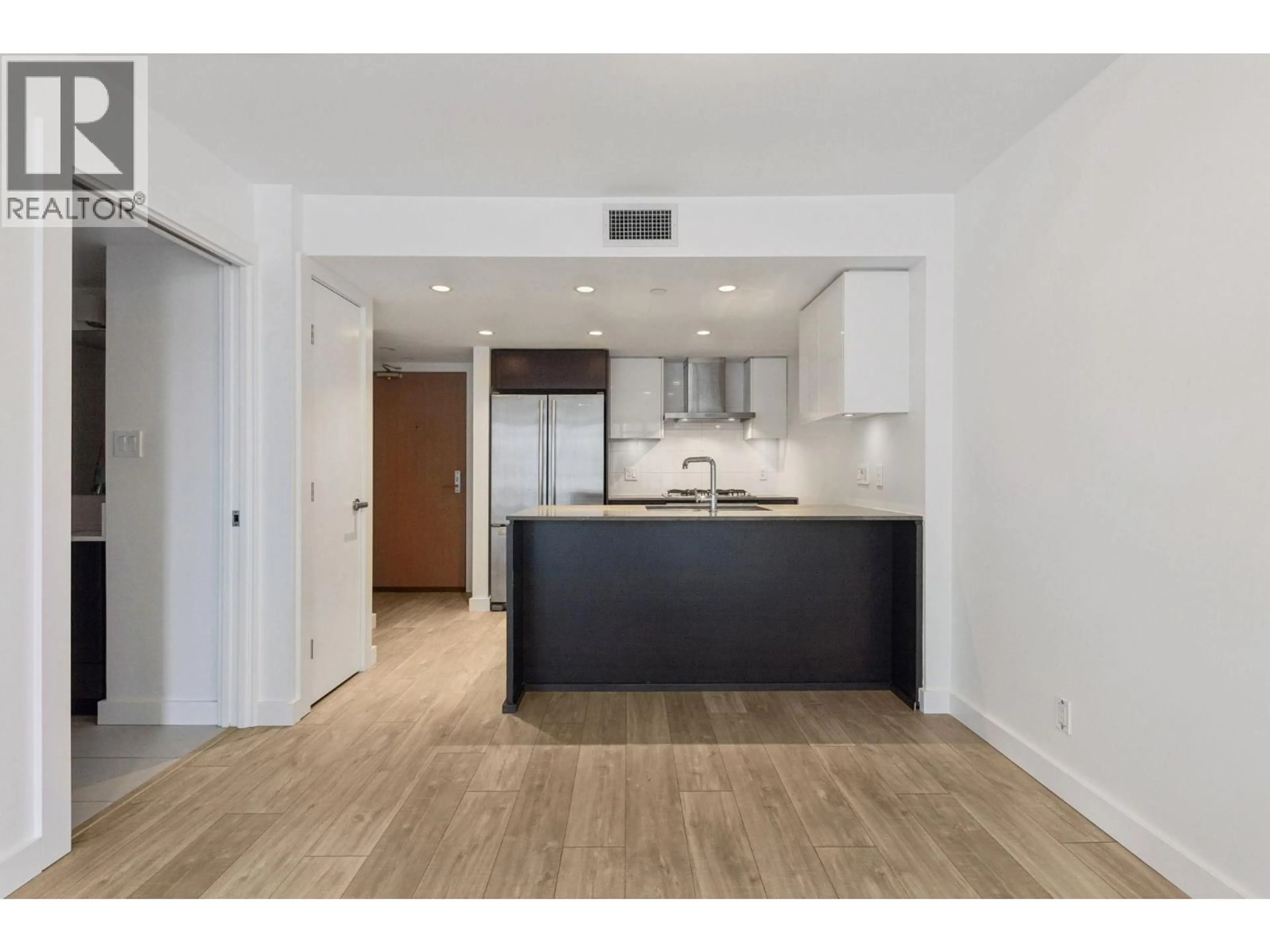 Open concept kitchen, wood/laminate floor for 816 - 1618 QUEBEC STREET, Vancouver British Columbia V6A0C5