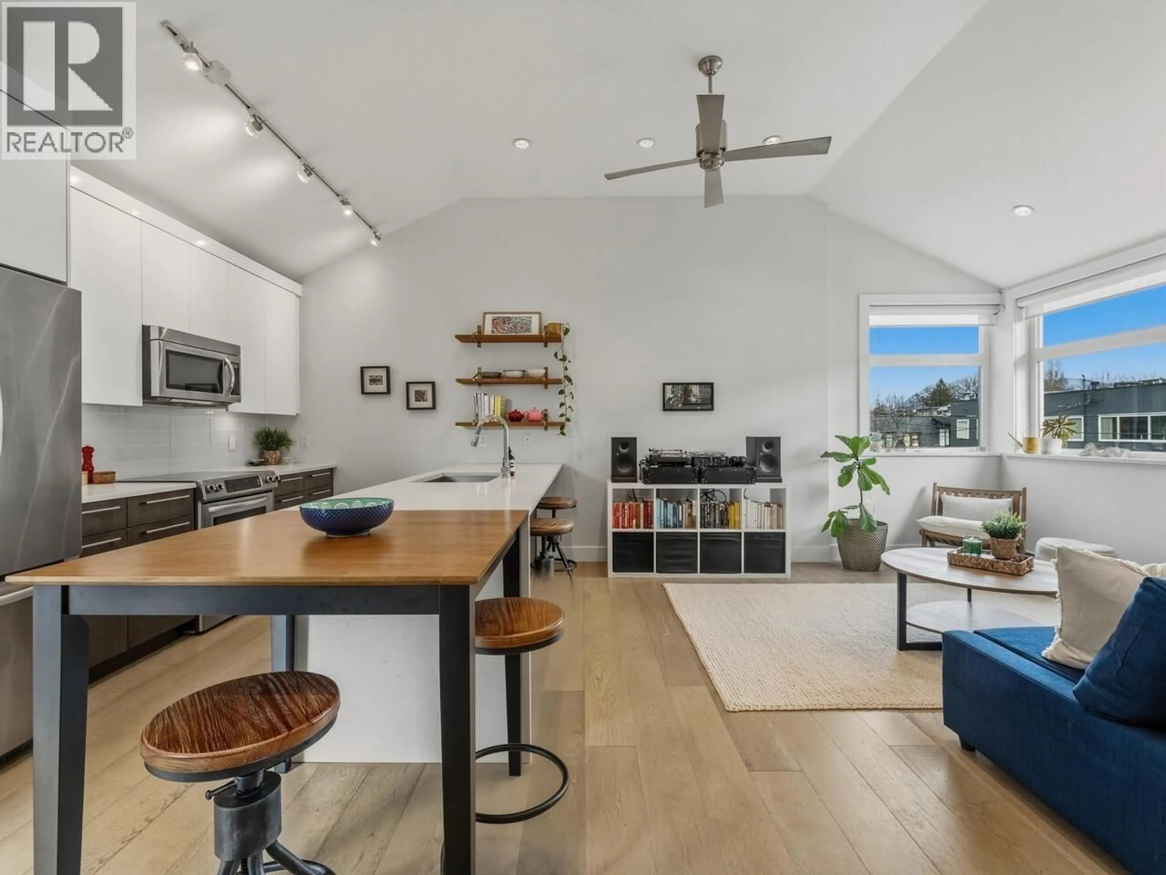 Open concept kitchen, wood/laminate floor for 1681 KITCHENER STREET, Vancouver British Columbia V5L2W1