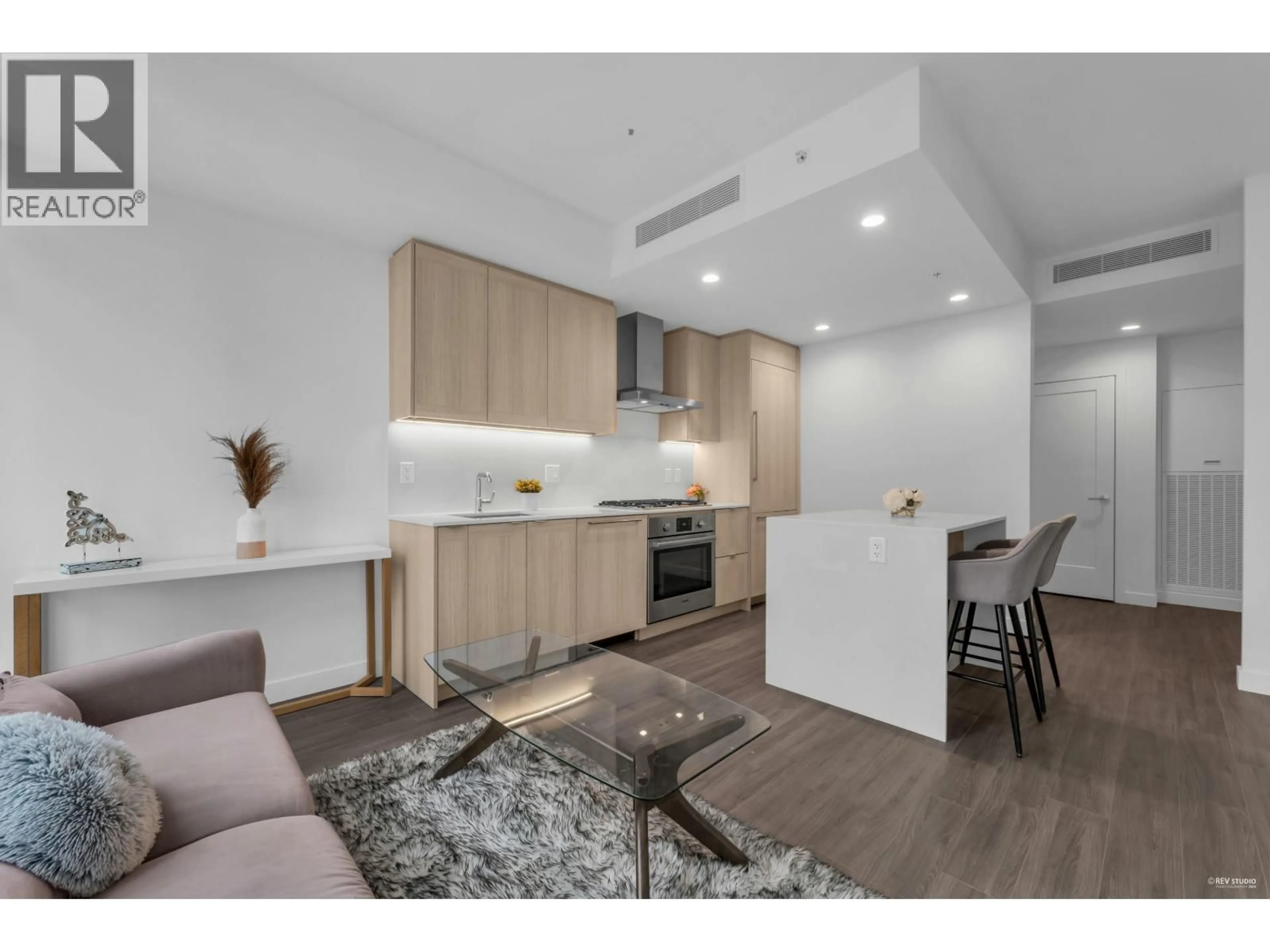 Open concept kitchen, wood/laminate floor for 1807 - 2351 BETA AVENUE, Burnaby British Columbia V5C0M2