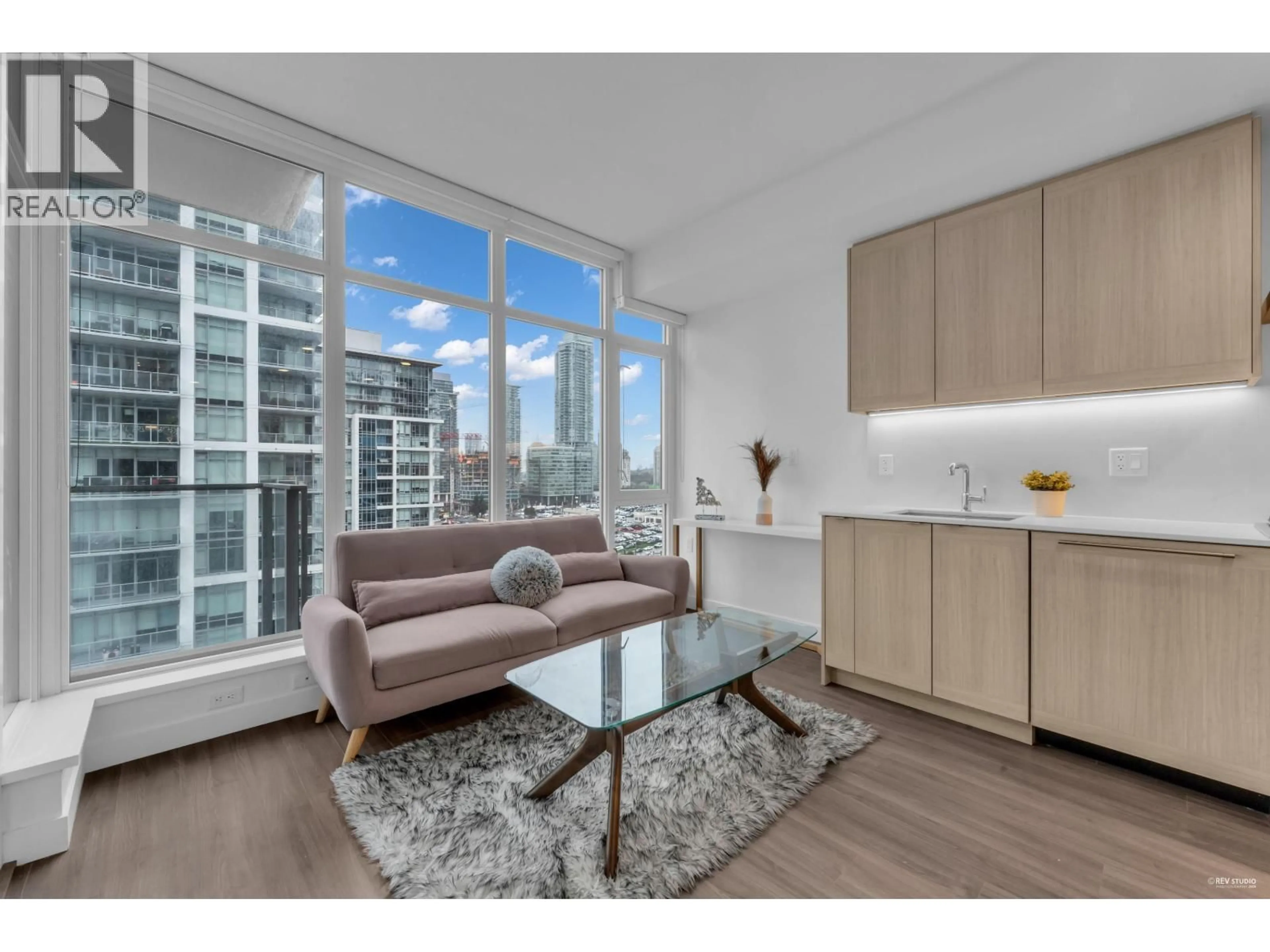 Living room with furniture, wood/laminate floor for 1807 - 2351 BETA AVENUE, Burnaby British Columbia V5C0M2