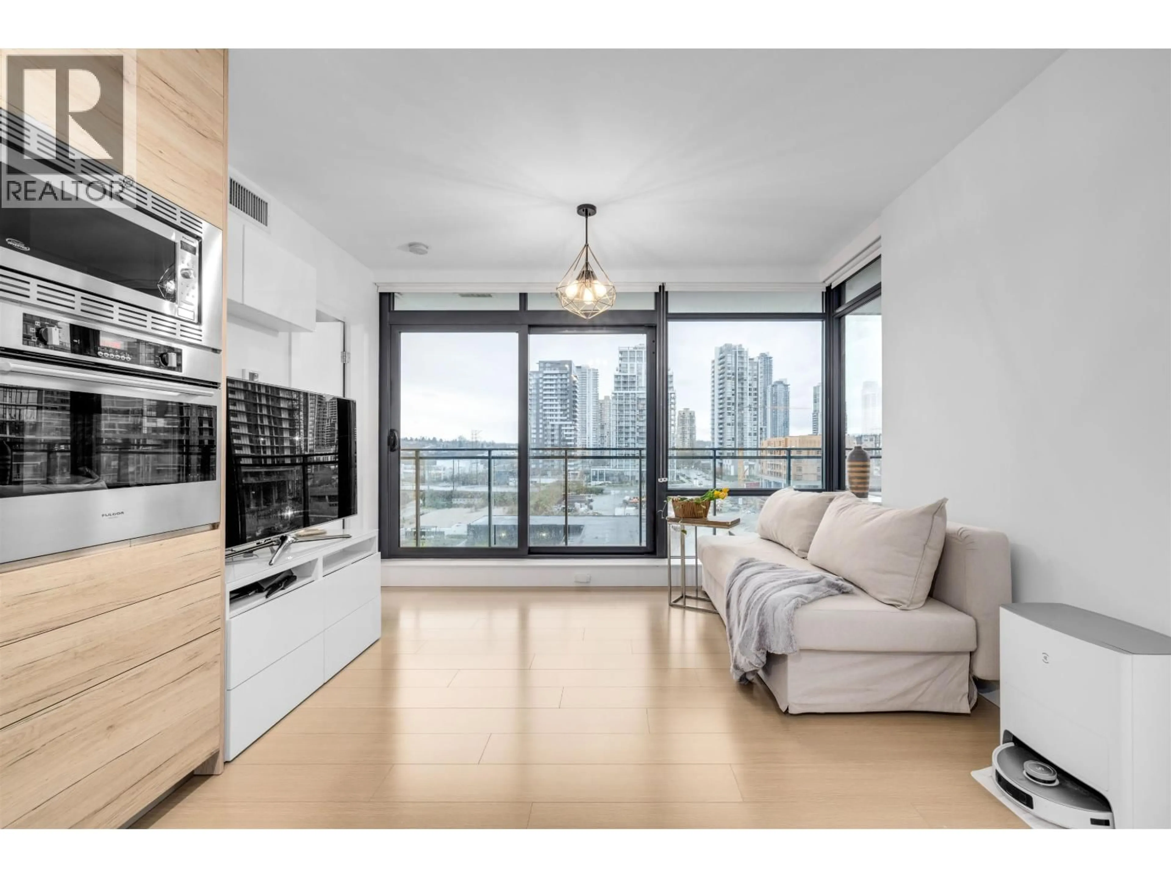 Living room with furniture, wood/laminate floor for 1008 - 2378 ALPHA AVENUE, Burnaby British Columbia V5C0K2