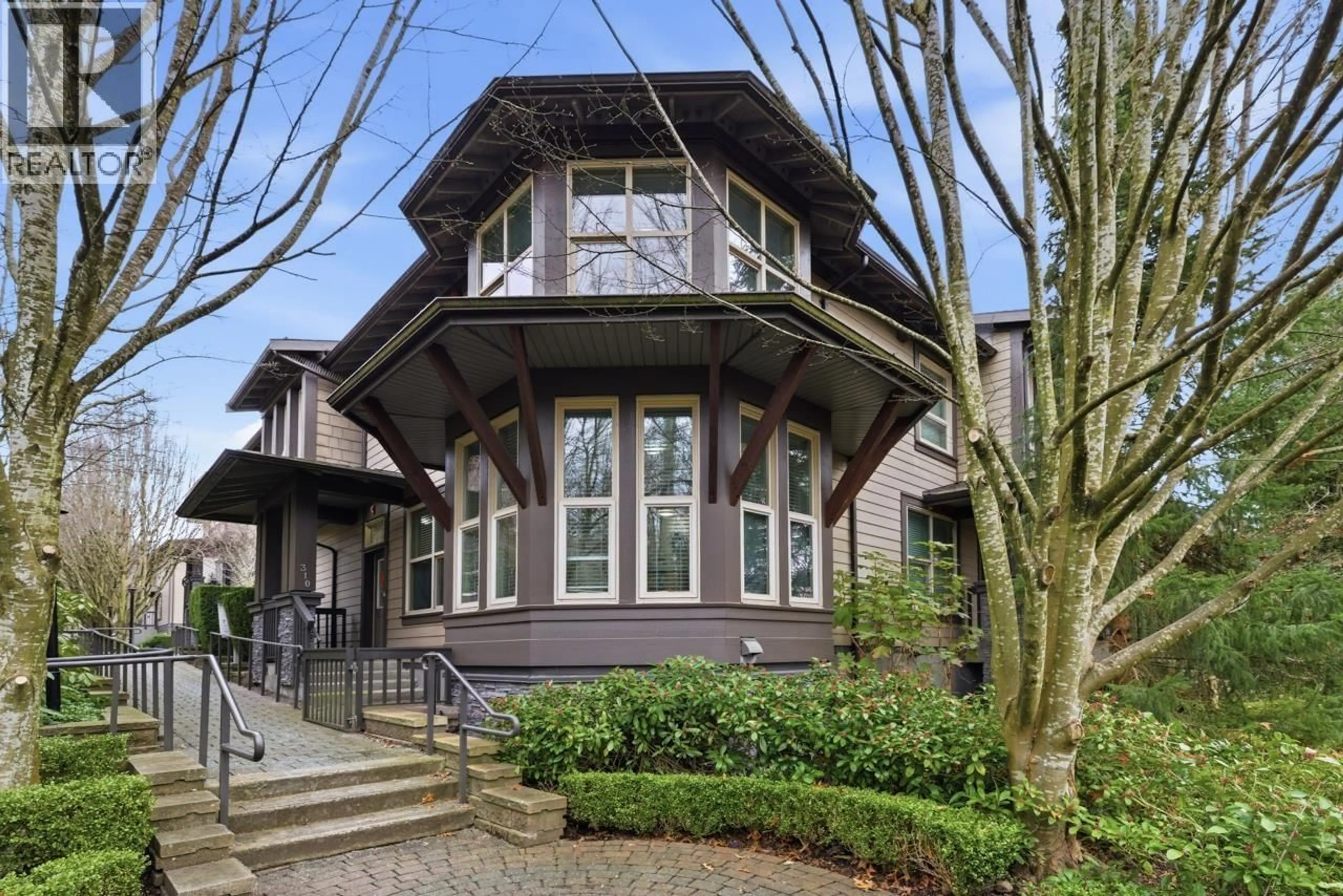 Home with brick exterior material, street for 310 14TH STREET, North Vancouver British Columbia V7L2N6