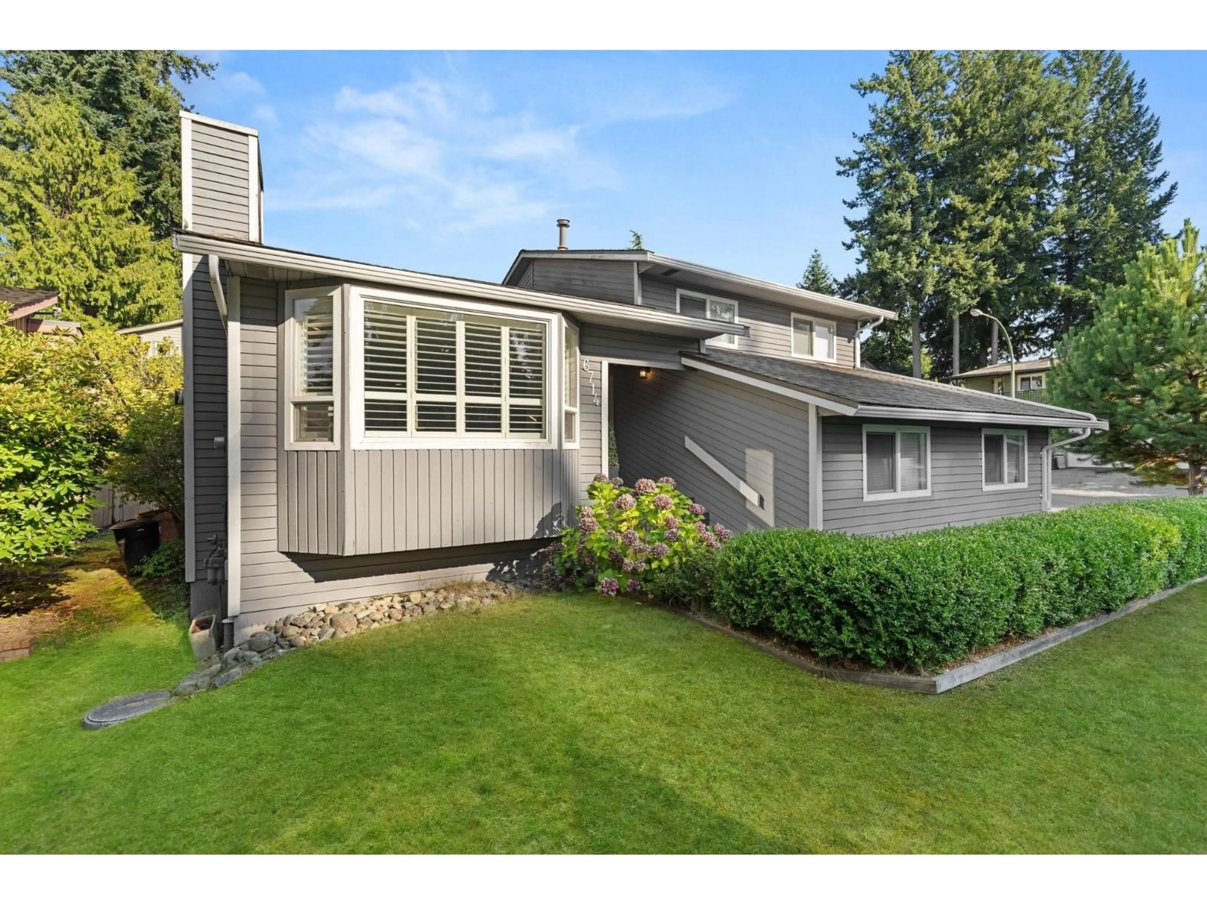 Home with vinyl exterior material, street for 6714 NICHOLSON ROAD, Delta British Columbia V4E2T5