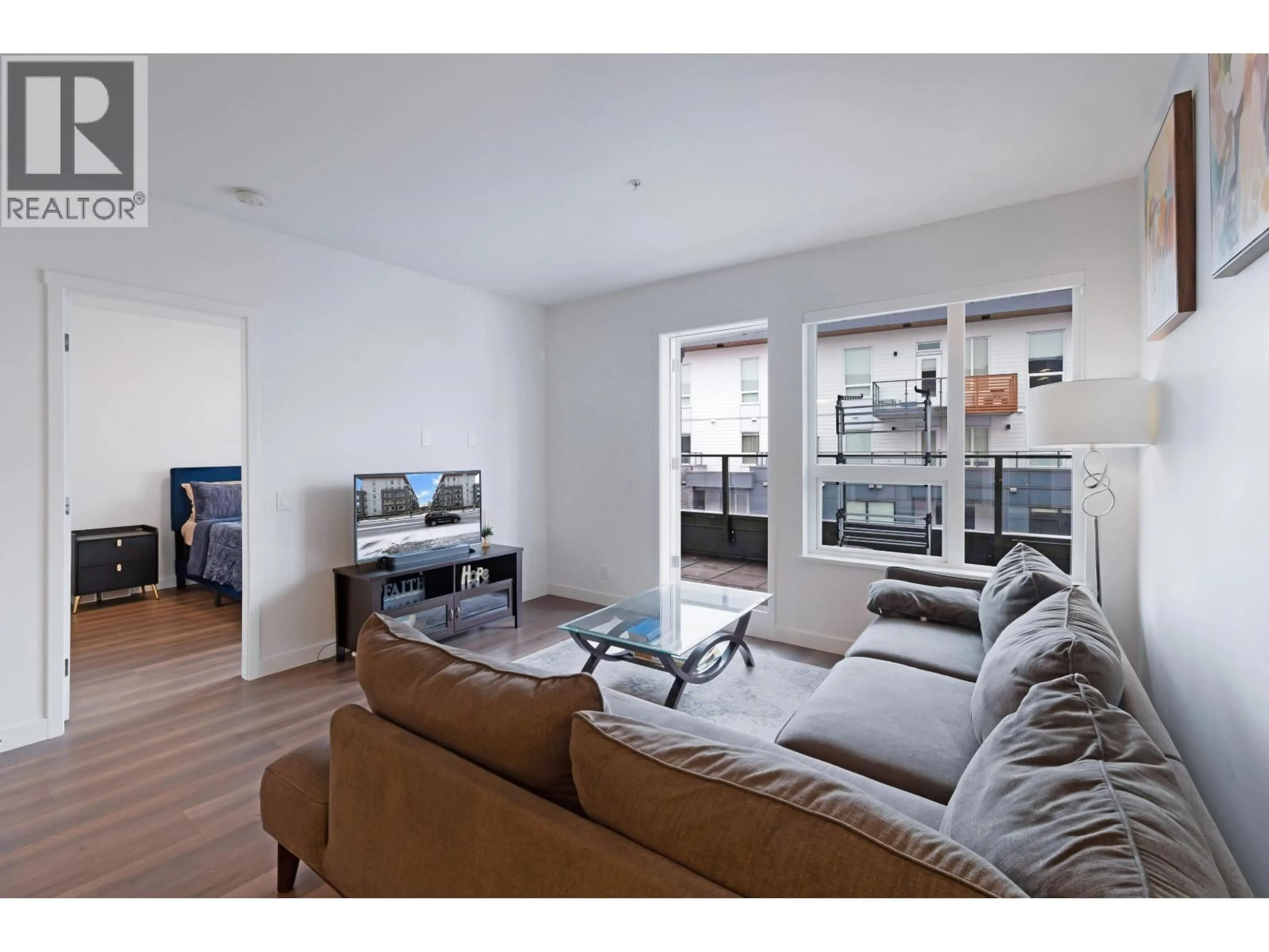 Living room with furniture, wood/laminate floor for 510 - 648 LEA AVENUE, Coquitlam British Columbia V3J0P1