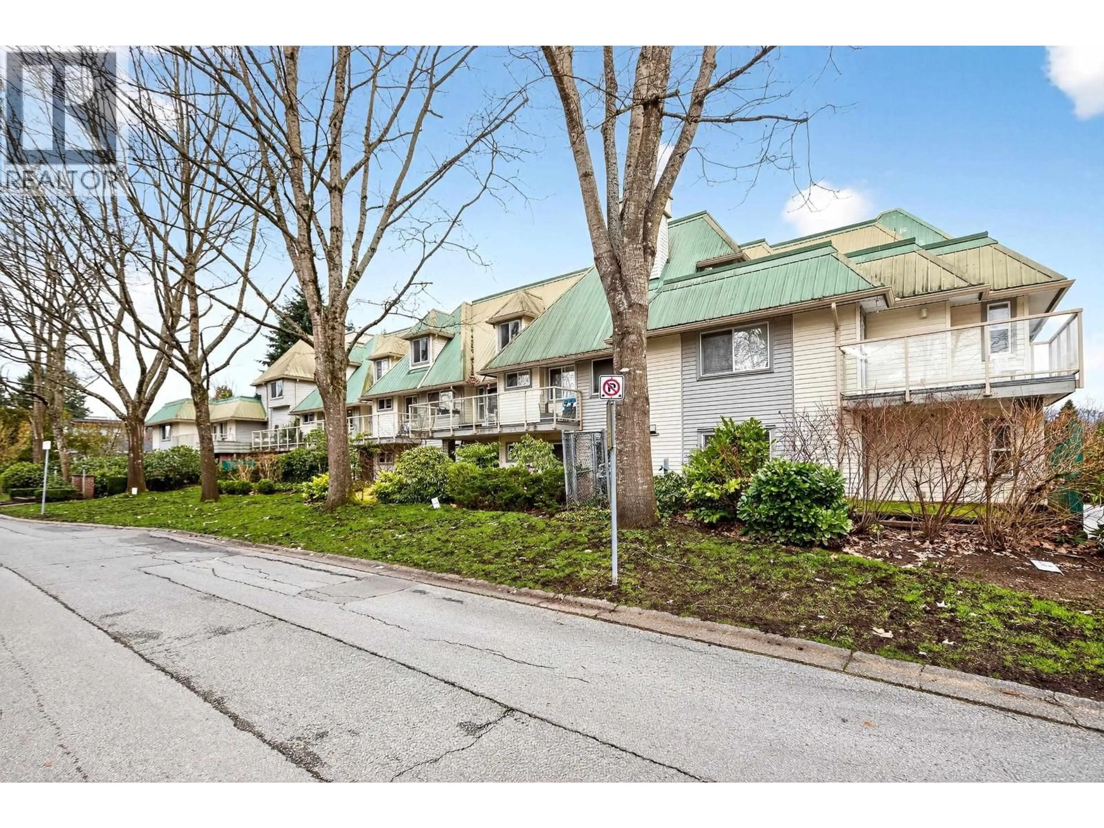 A pic from outside/outdoor area/front of a property/back of a property/a pic from drone, street for 101 - 22275 123 AVENUE, Maple Ridge British Columbia V2X4E1