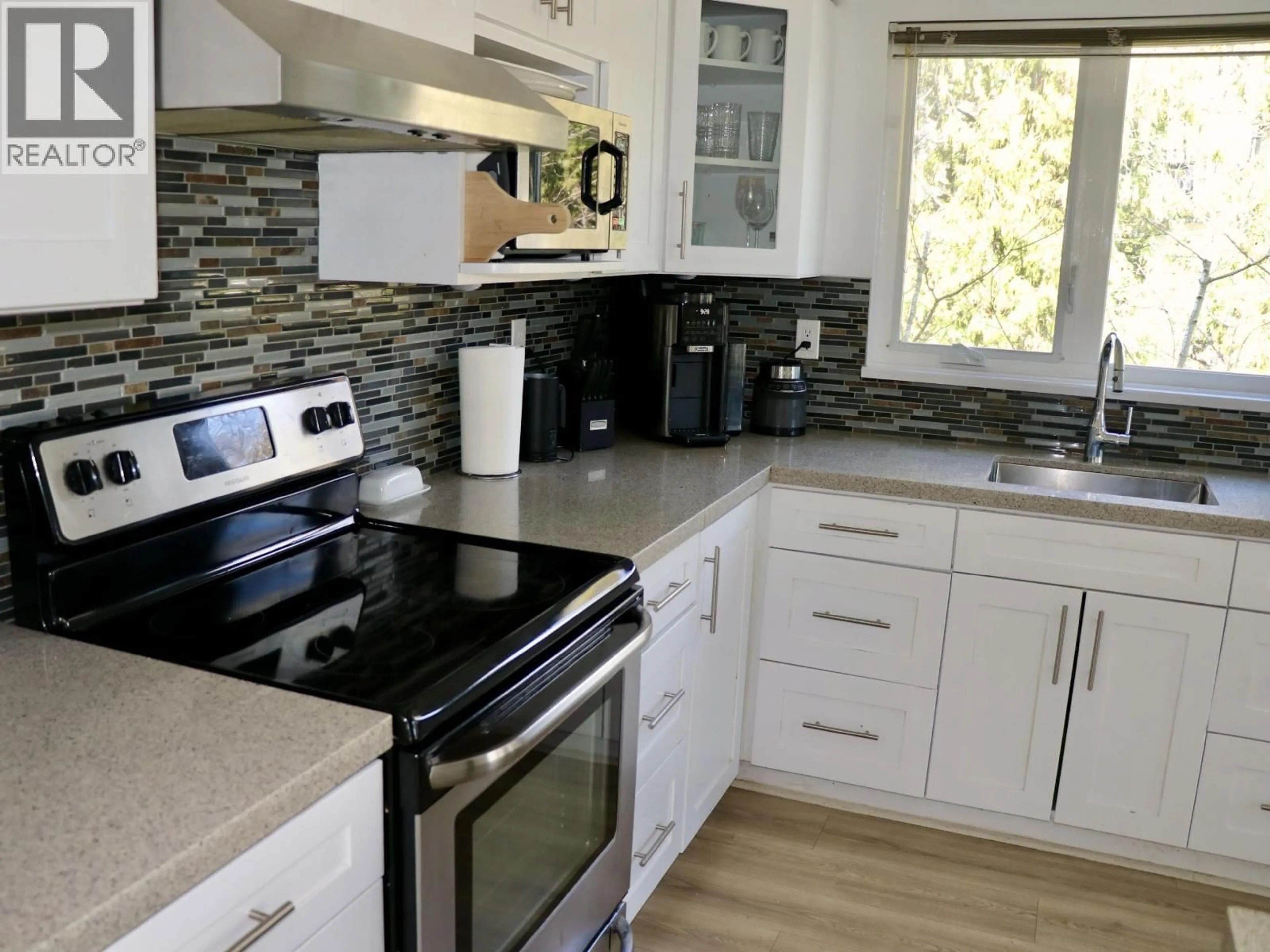 Open concept kitchen, unknown for 403 - 106 KINGS ROAD, North Vancouver British Columbia V7N2L8