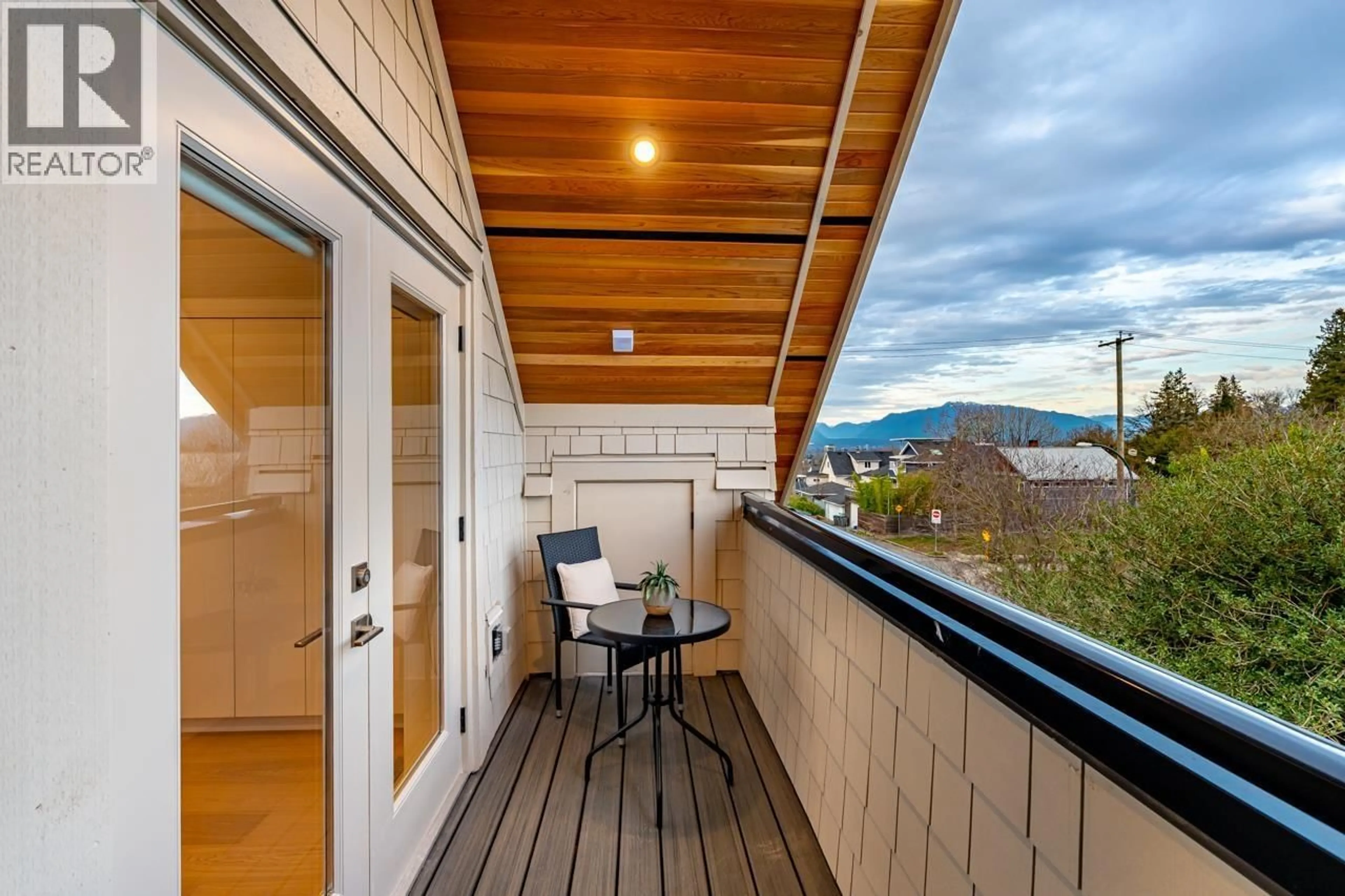 Balcony in the apartment, mountain view for 1 - 5355 INVERNESS STREET, Vancouver British Columbia V5W3P2