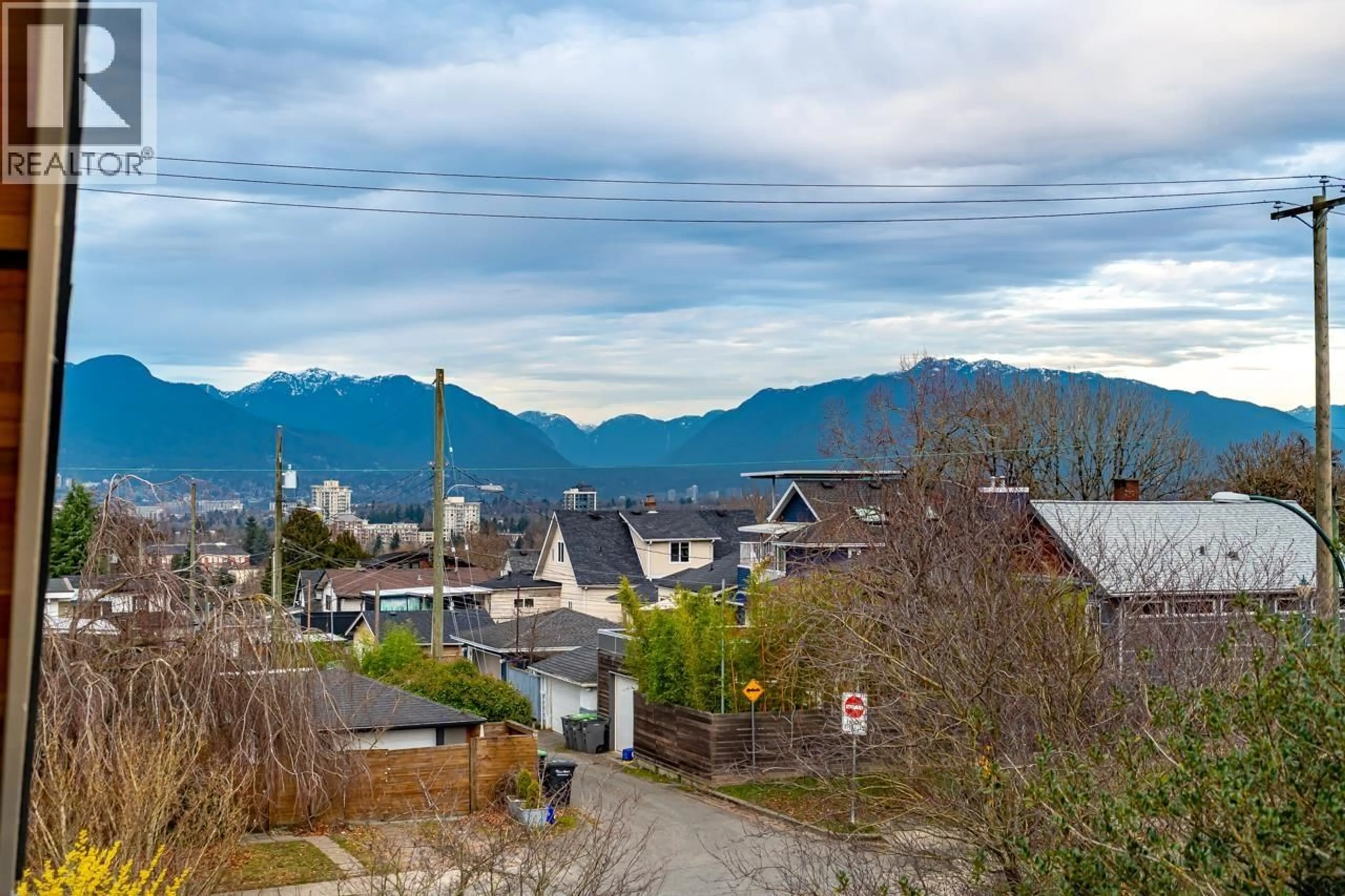 A pic from outside/outdoor area/front of a property/back of a property/a pic from drone, mountain view for 1 - 5355 INVERNESS STREET, Vancouver British Columbia V5W3P2