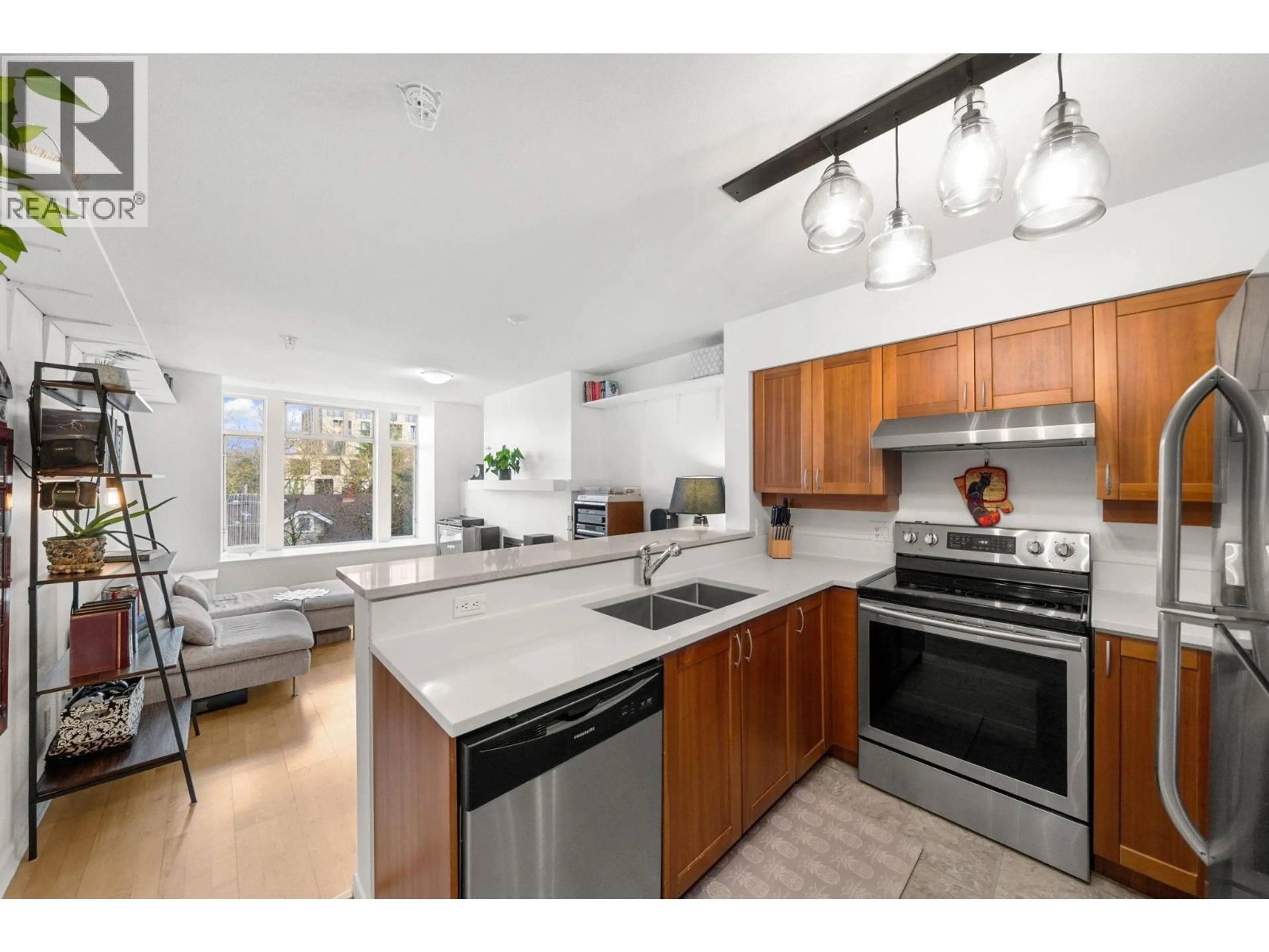 Open concept kitchen, unknown for 301 - 3727 10 AVENUE, Vancouver British Columbia V6R2G5