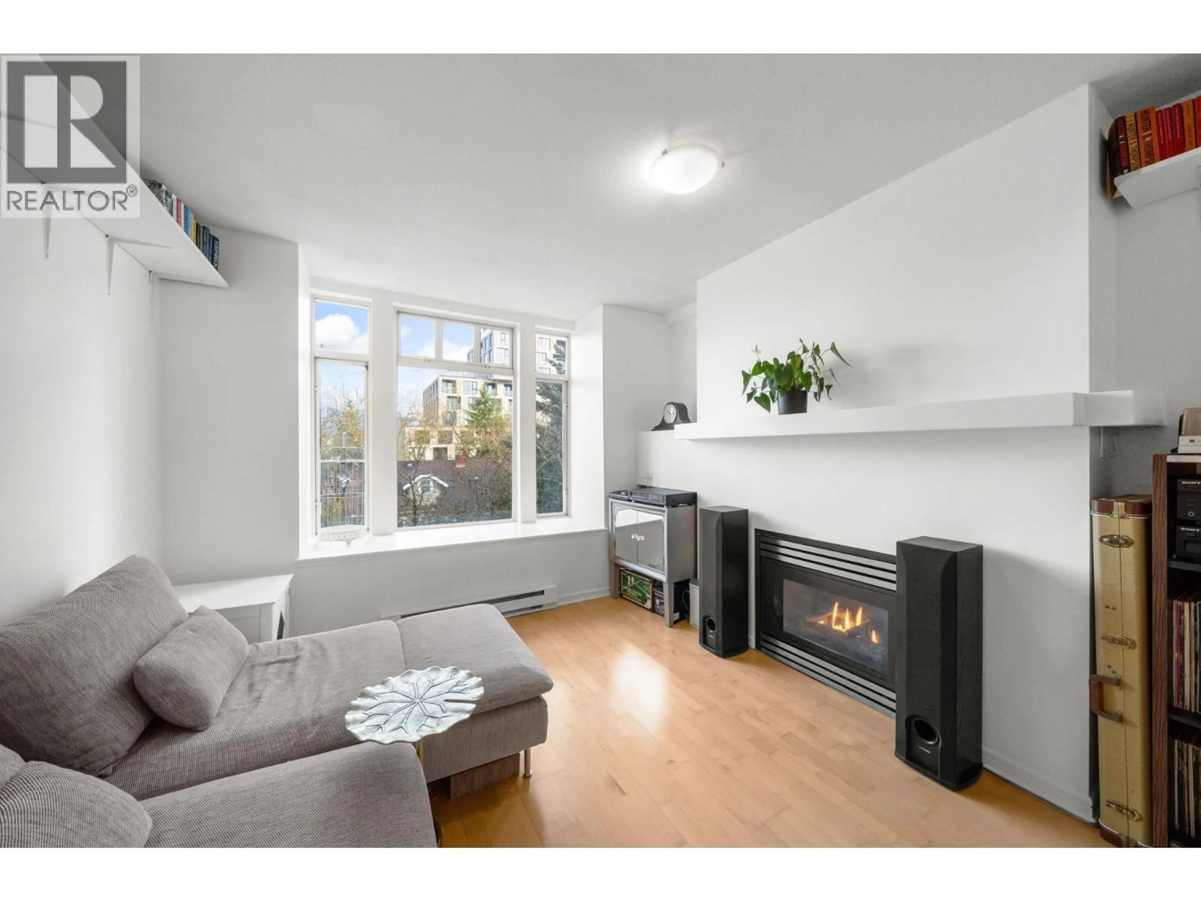 Living room with furniture, unknown for 301 - 3727 10 AVENUE, Vancouver British Columbia V6R2G5