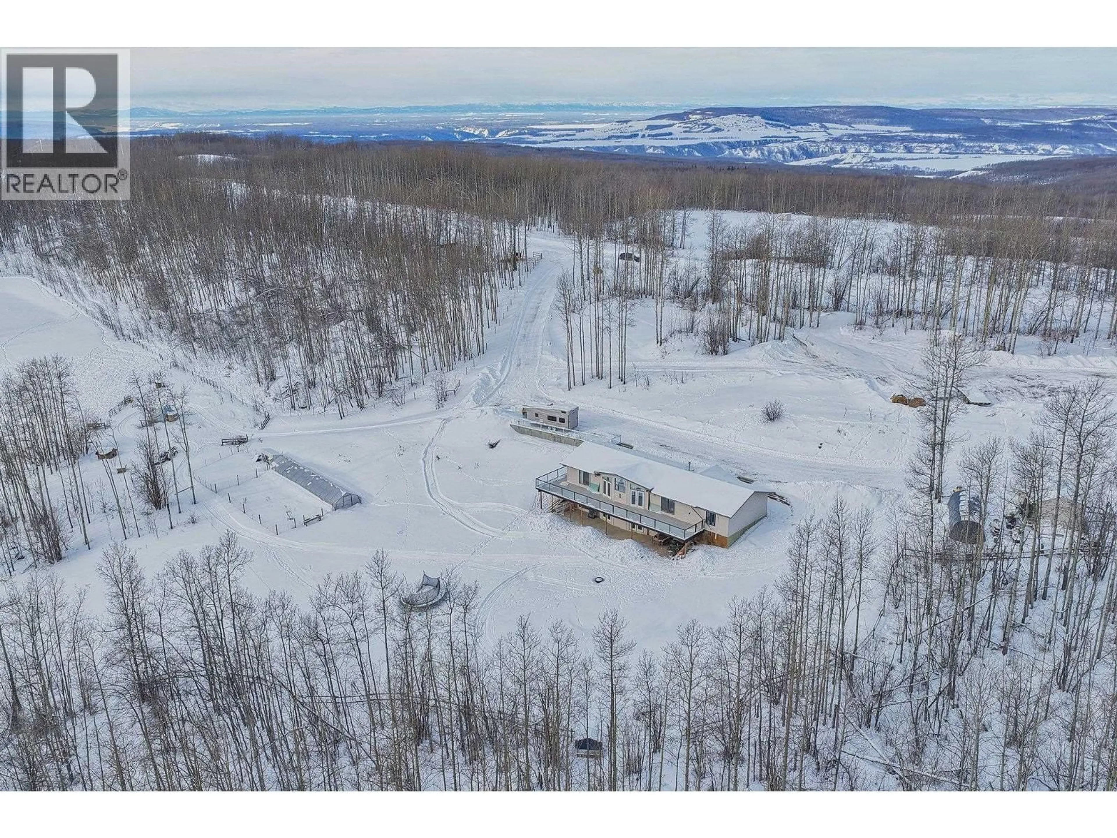 A pic from outside/outdoor area/front of a property/back of a property/a pic from drone, mountain view for 13389 DONIS ROAD, Fort St. John British Columbia V1J8J2