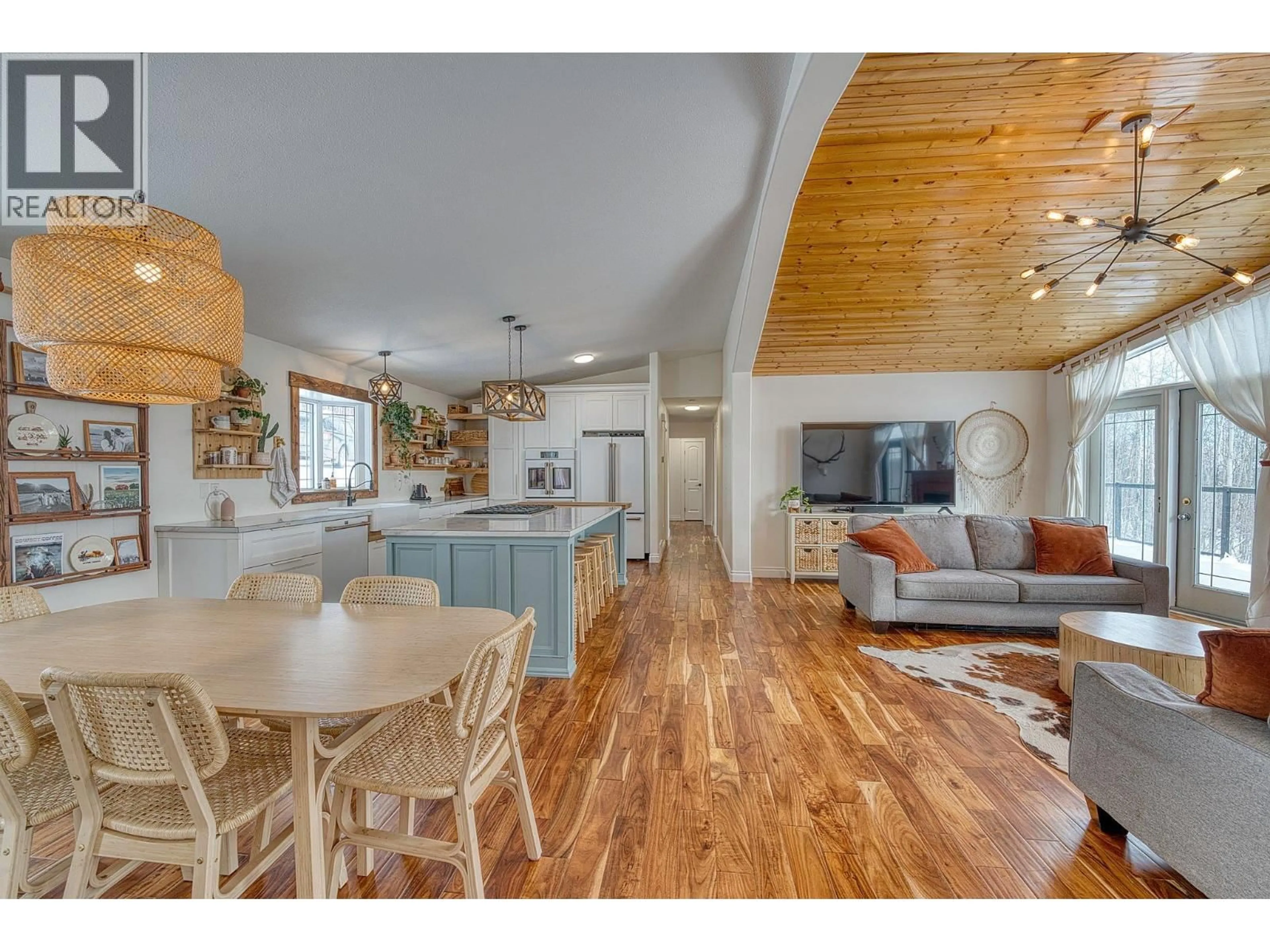 Open concept kitchen, wood/laminate floor for 13389 DONIS ROAD, Fort St. John British Columbia V1J8J2