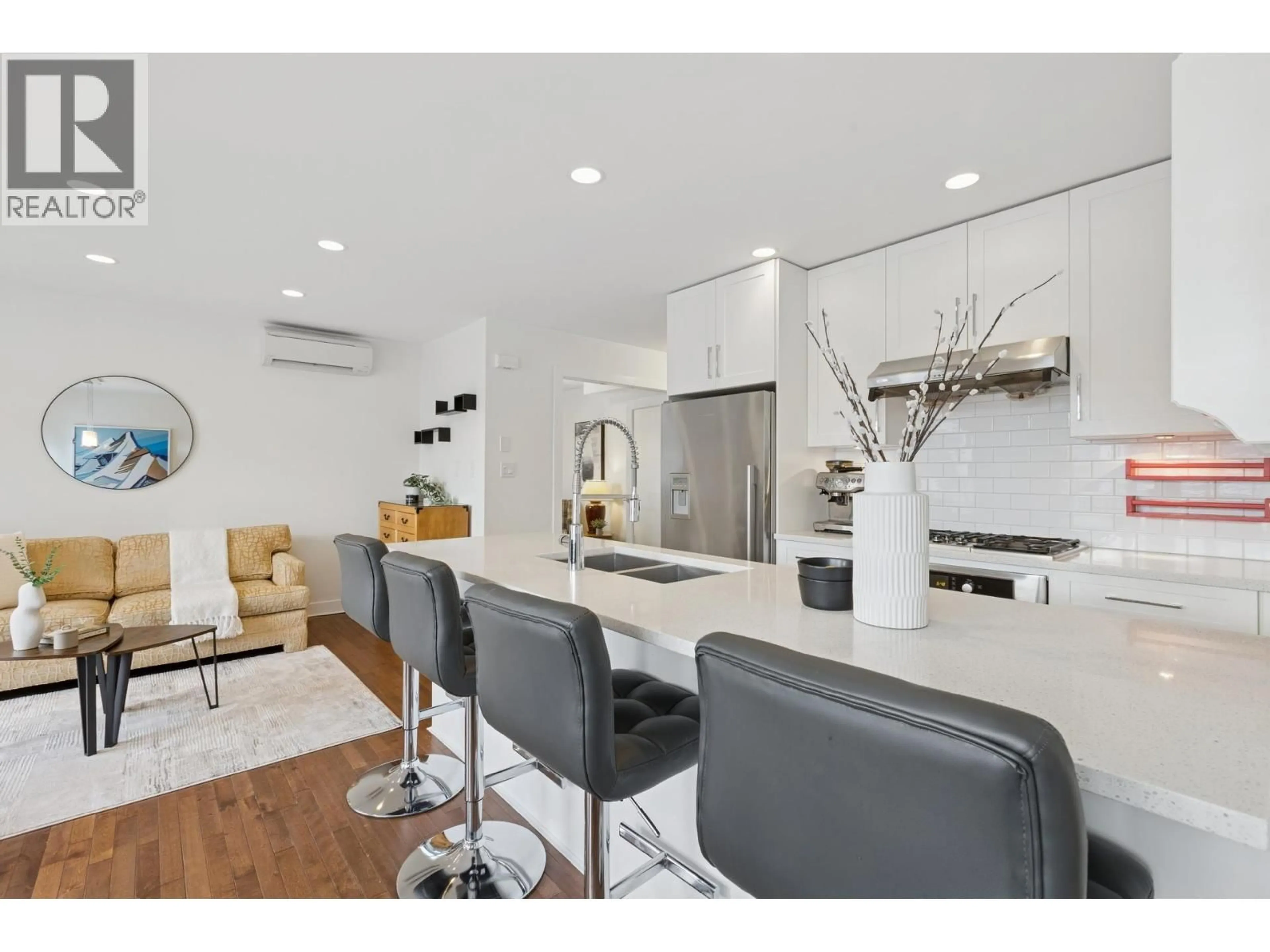 Open concept kitchen, unknown for 205 18TH STREET, North Vancouver British Columbia V7L2X7