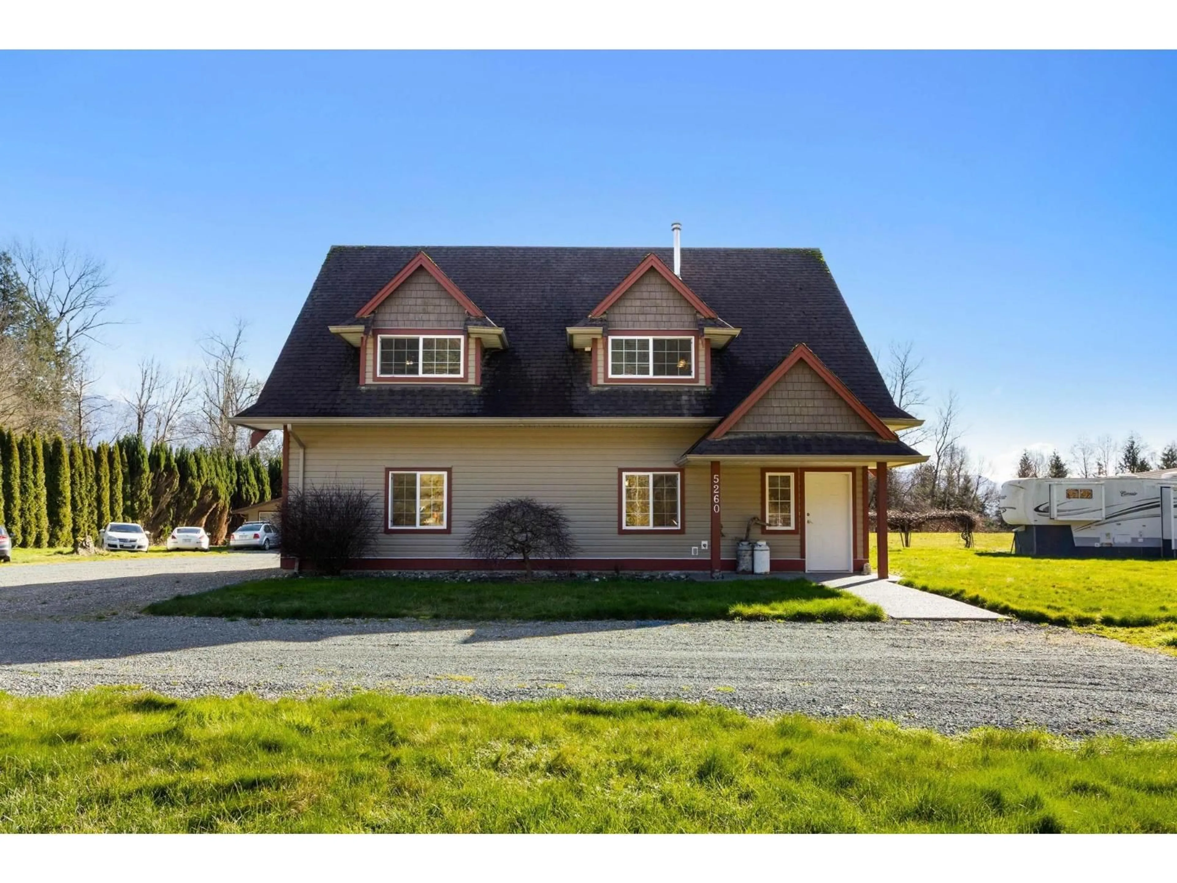 Home with vinyl exterior material, street for 5260 MCCALLUM ROAD, Agassiz British Columbia V0M1A3