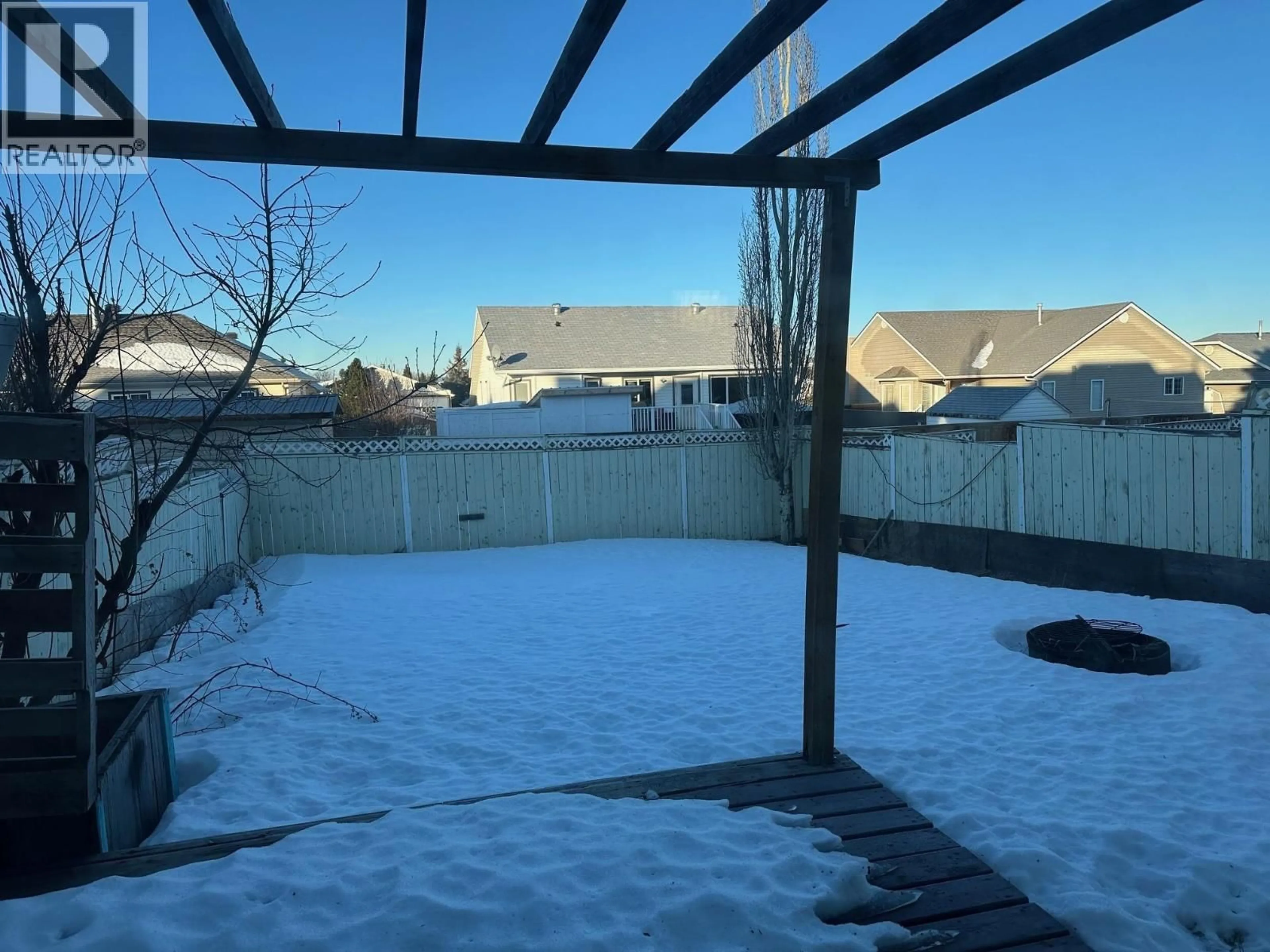 A pic from outside/outdoor area/front of a property/back of a property/a pic from drone, mountain view for 11308 89A STREET, Fort St. John British Columbia V1J5N3