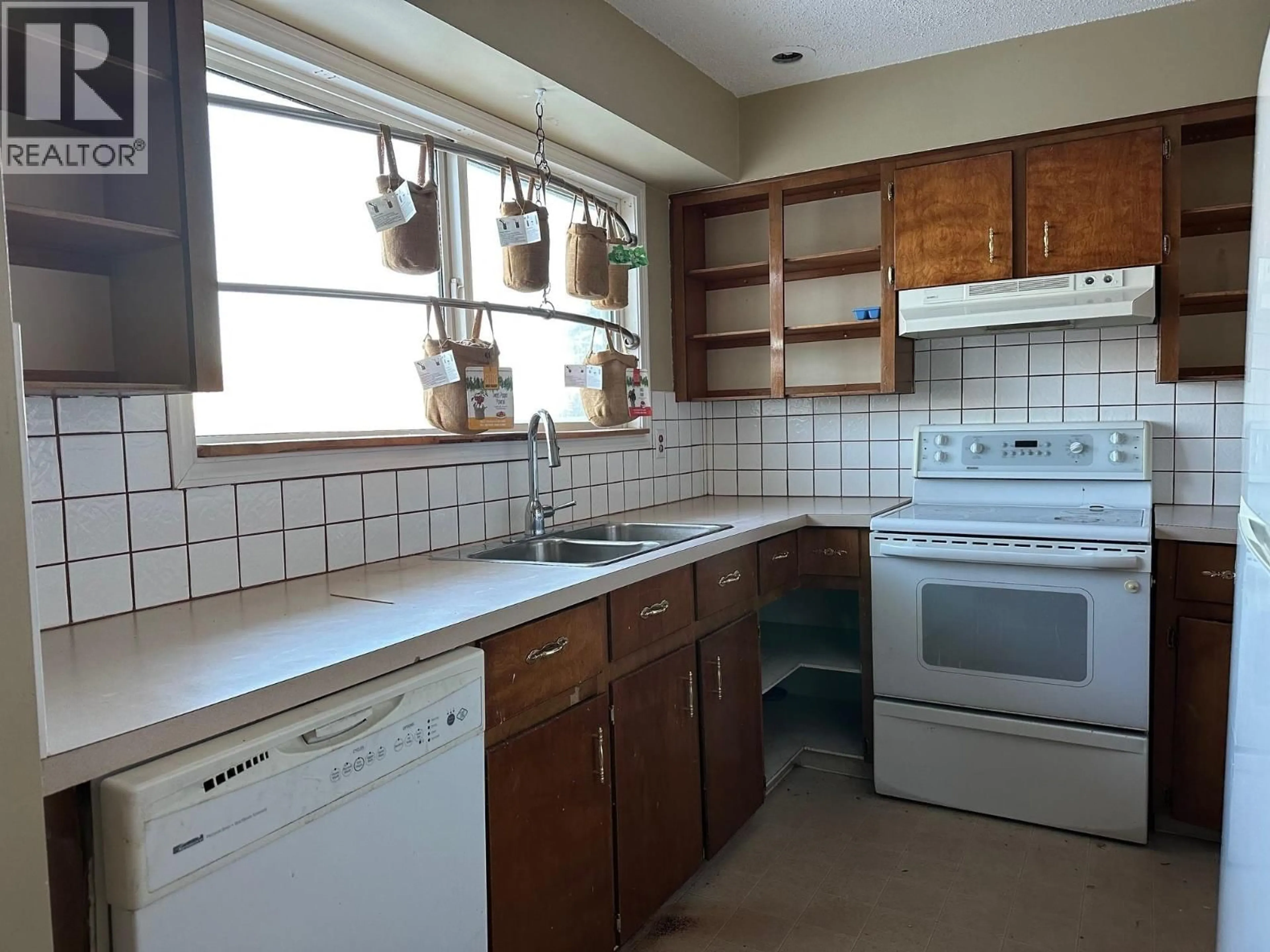 Standard kitchen, ceramic/tile floor for 11308 89A STREET, Fort St. John British Columbia V1J5N3