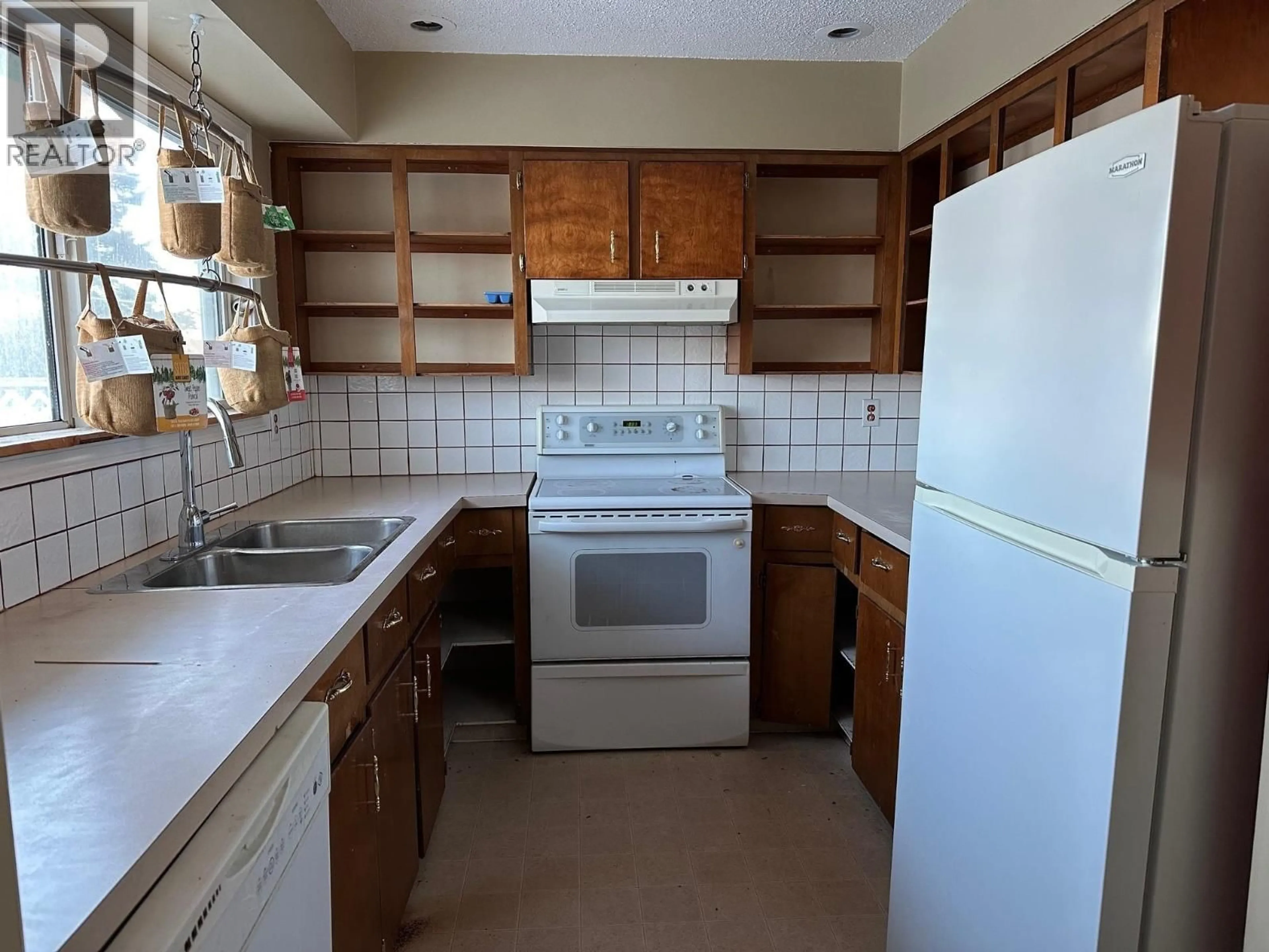 Standard kitchen, ceramic/tile floor for 11308 89A STREET, Fort St. John British Columbia V1J5N3