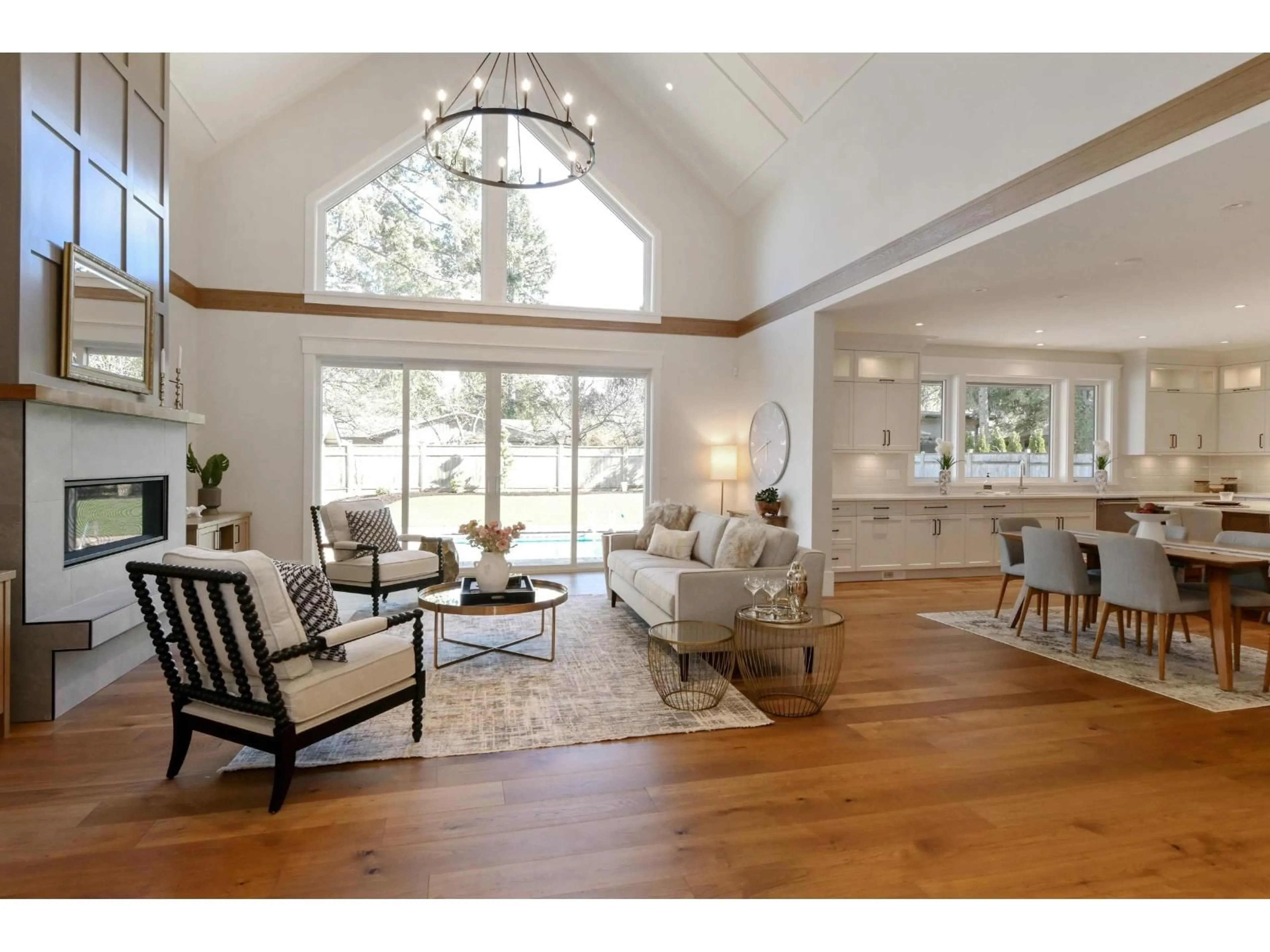 Living room with furniture, wood/laminate floor for 4560 198 STREET, Langley British Columbia V3A1E8