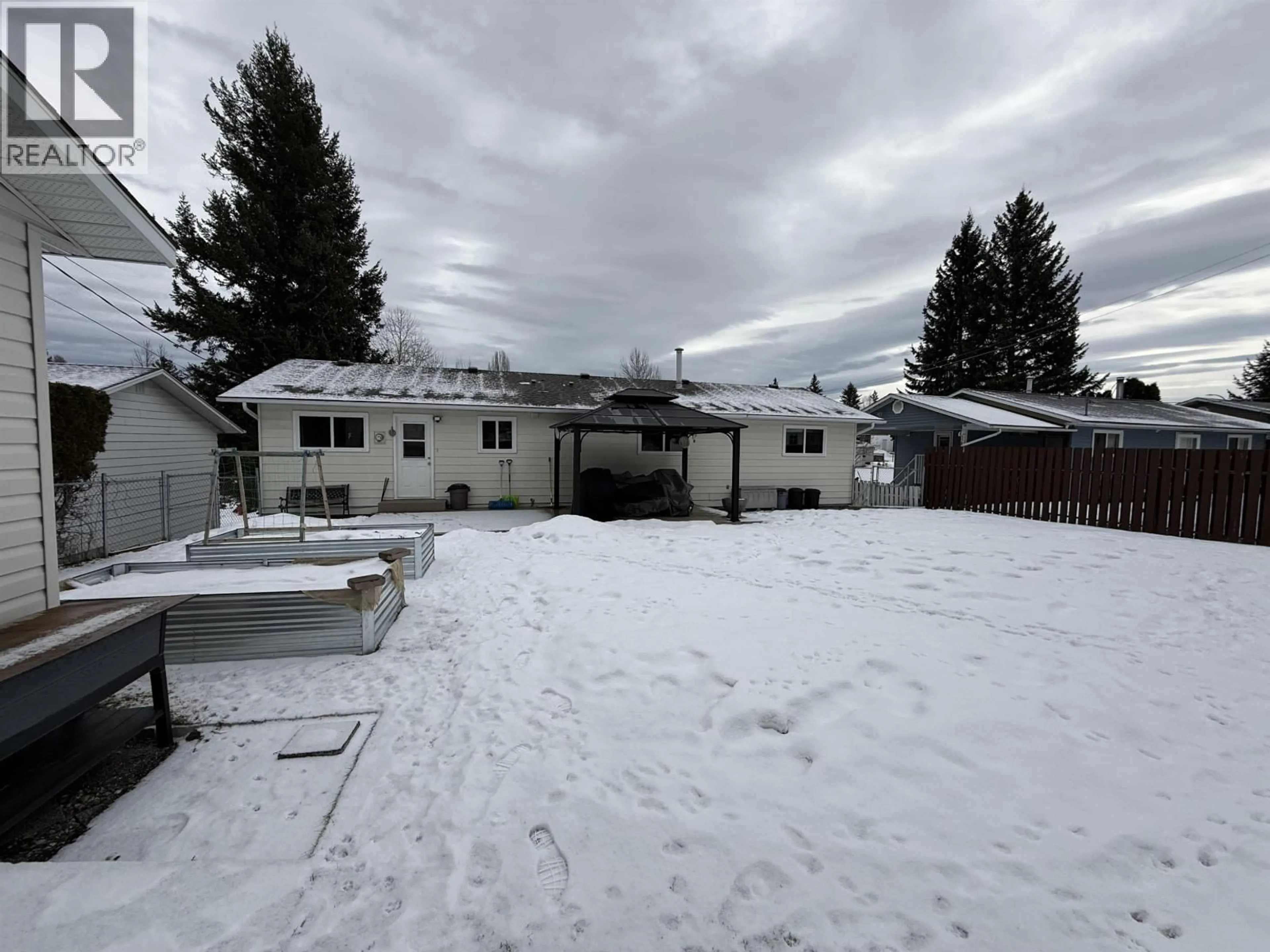 A pic from outside/outdoor area/front of a property/back of a property/a pic from drone, mountain view for 481 PATCHETT STREET, Quesnel British Columbia V2J4X6